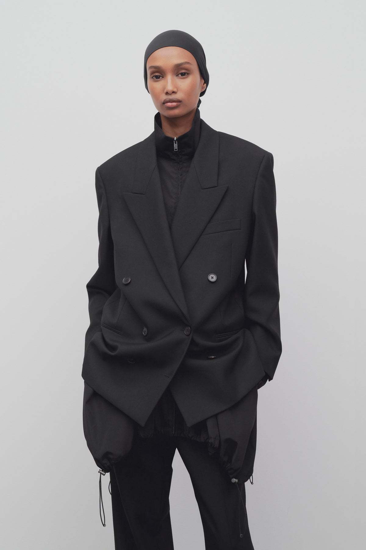 The Row Double-breasted Wool Coat In Black