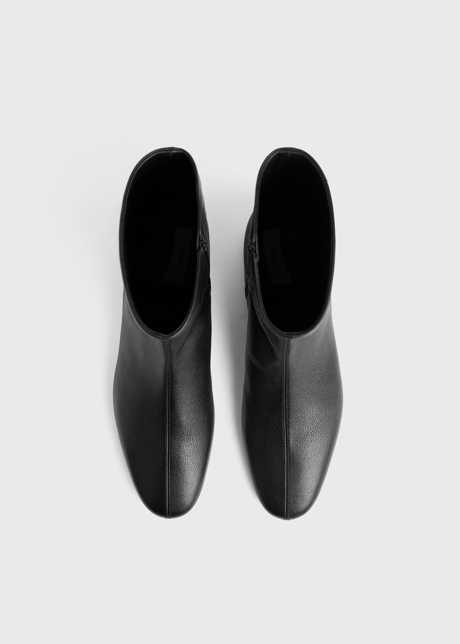 Totême Round-toed Ankle Boots In Black