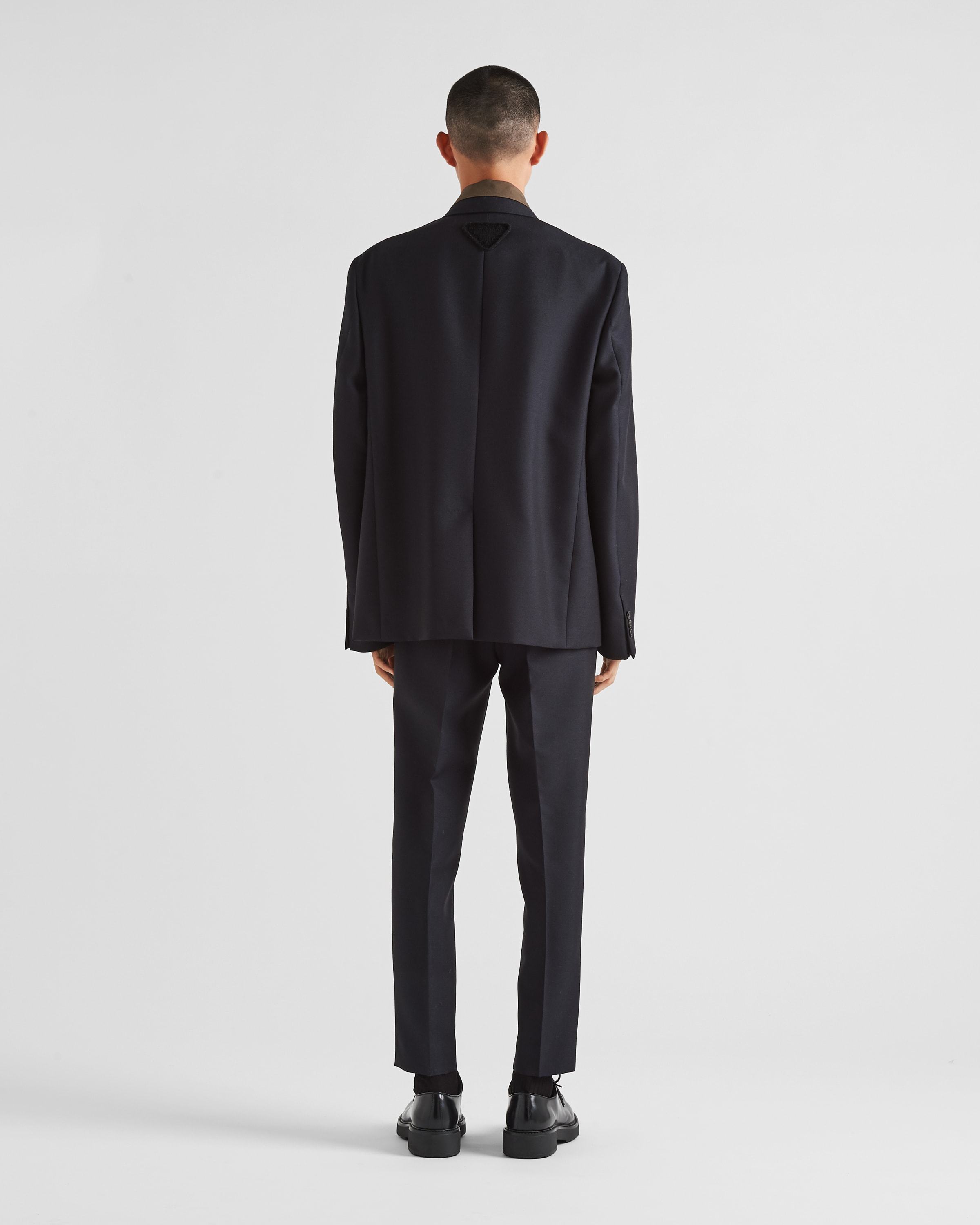 Prada Pleat-detail Tailored Trousers In Blue