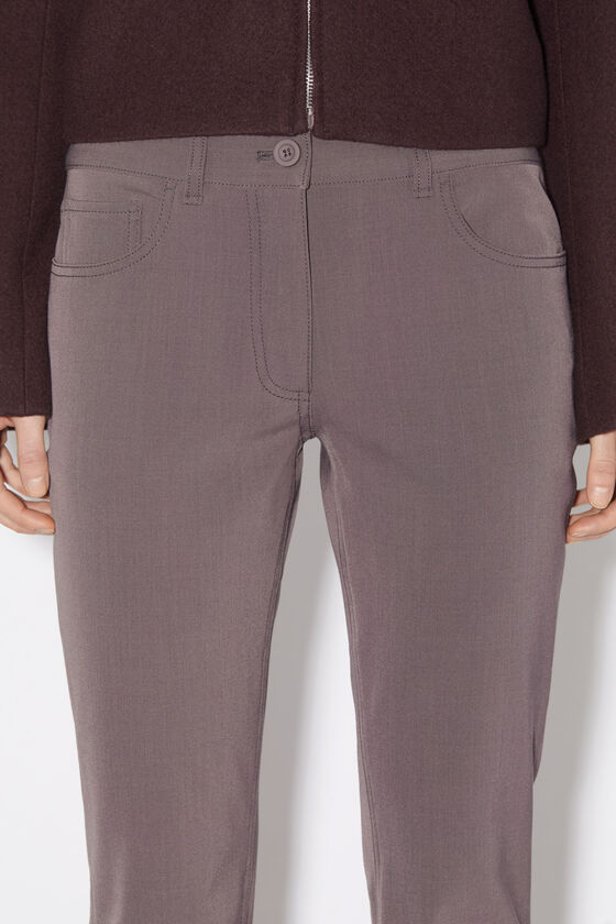 Acne Studios Low-rise Flared Trousers In Gray