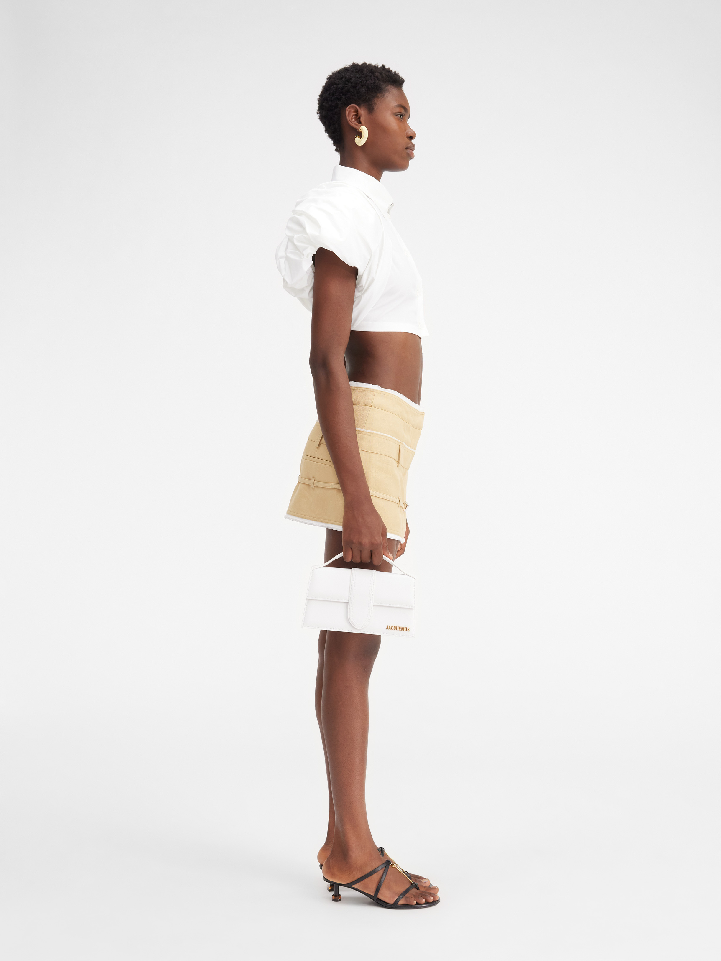 Jacquemus Caraco Buckled Layered Woven Mini Skirt In Nude
