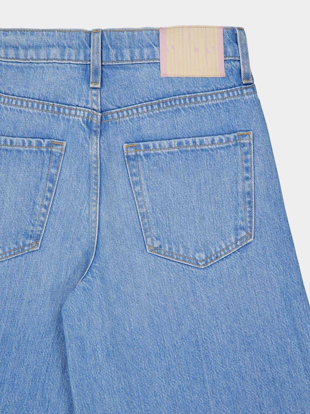 Mother Slung Sugar Cone Sneak Low-rise Flared Jeans In Blue