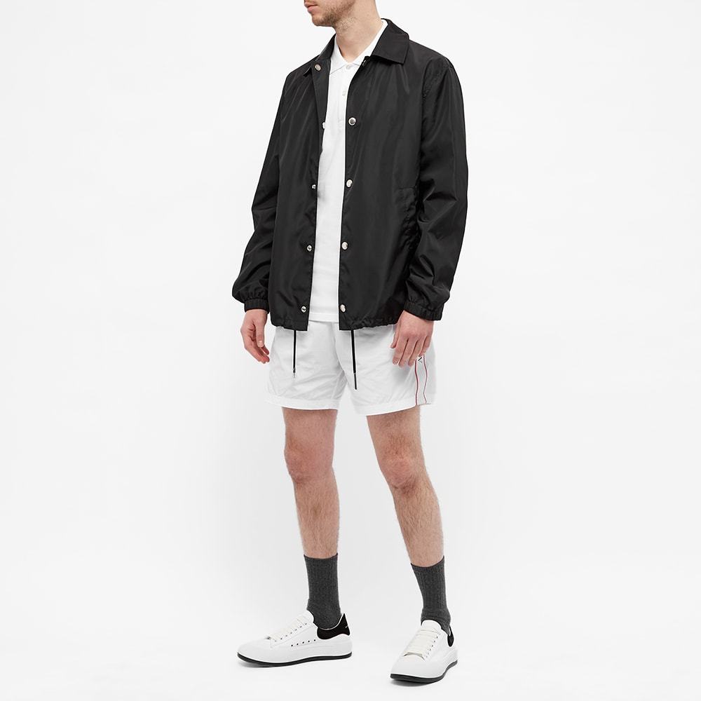 Alexander Mcqueen Graffiti Logo Printed Polo Shirt In White