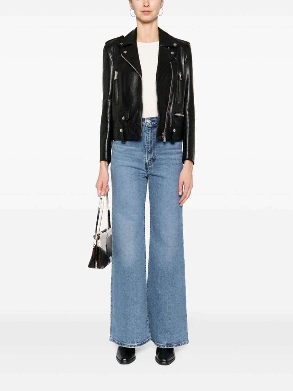 Shop Levi's Mid-rise Flared Jeans In Blue