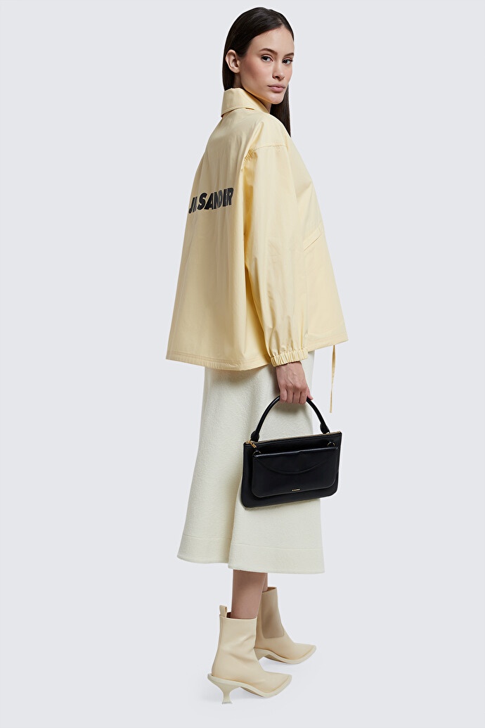 Jil Sander "coach Jacket With Logo Print" In Yellow