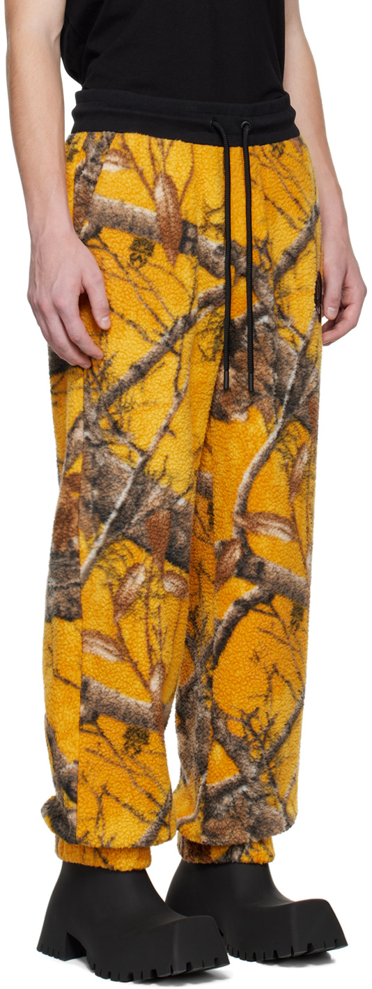 Moose Knuckles Graphic-print Fleece Track Pants In Yellow