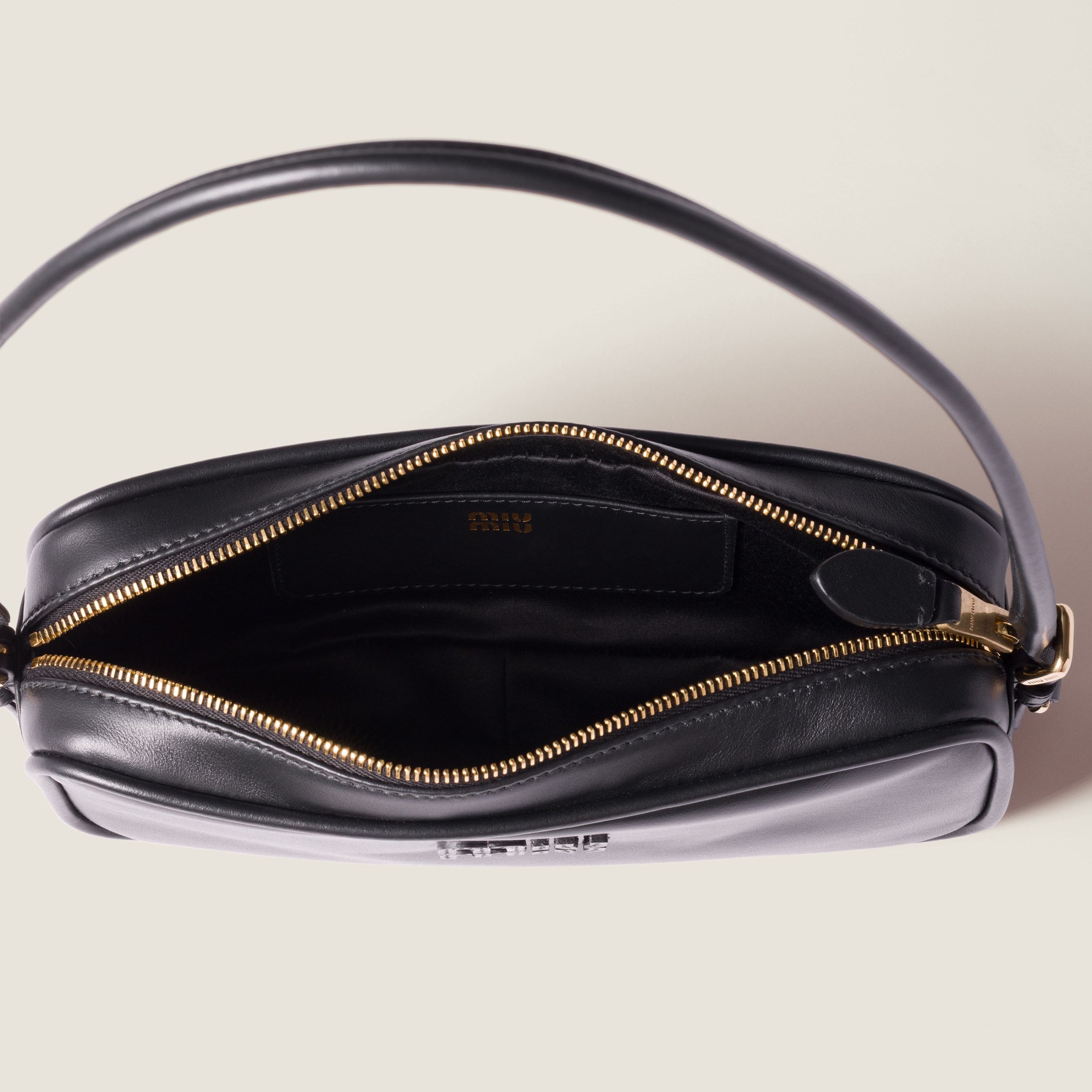 Miu Miu Leather Logo-detail Mini Bag In Black