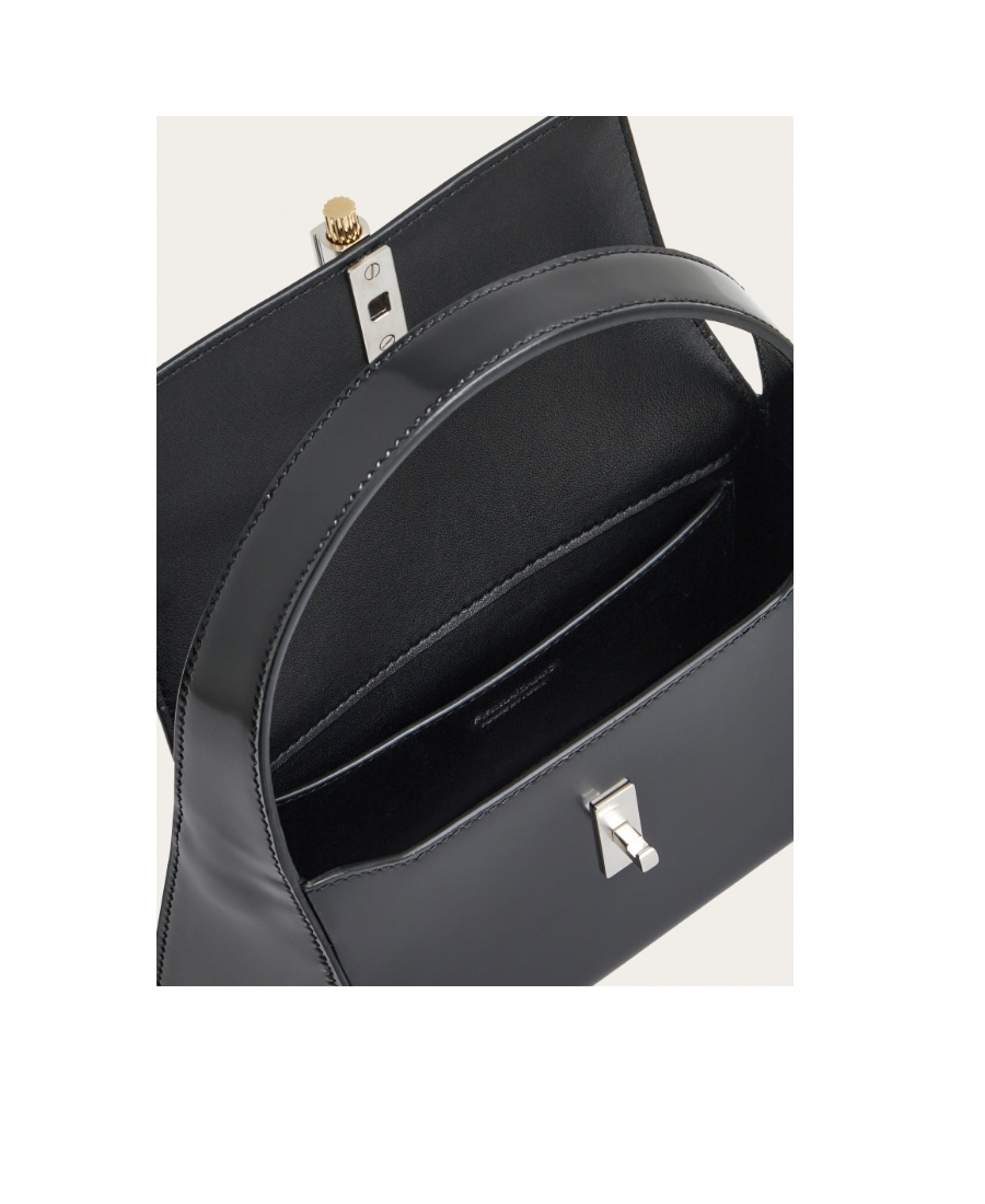 Shop Ferragamo Flip Shoulder Bag In Black