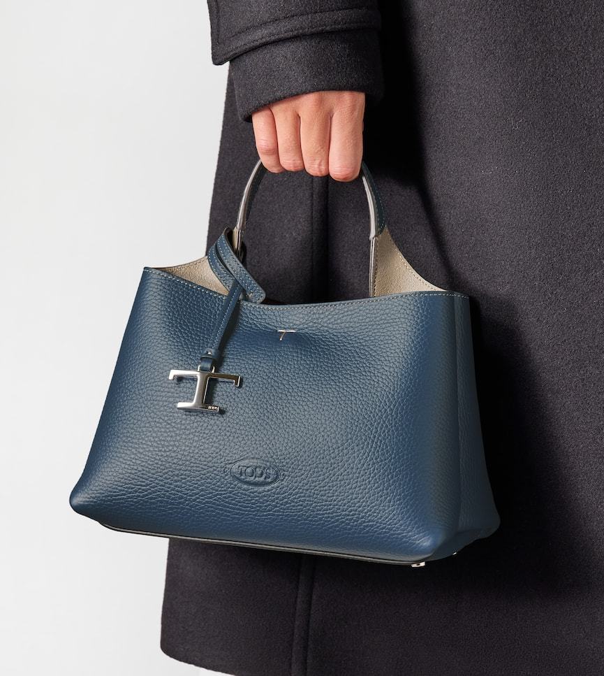 Tod's Leather Micro Clutch Bag Detachable Strap In Blue