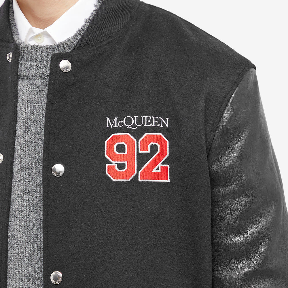 Alexander Mcqueen Logo-embroidered Varsity Jacket In Black