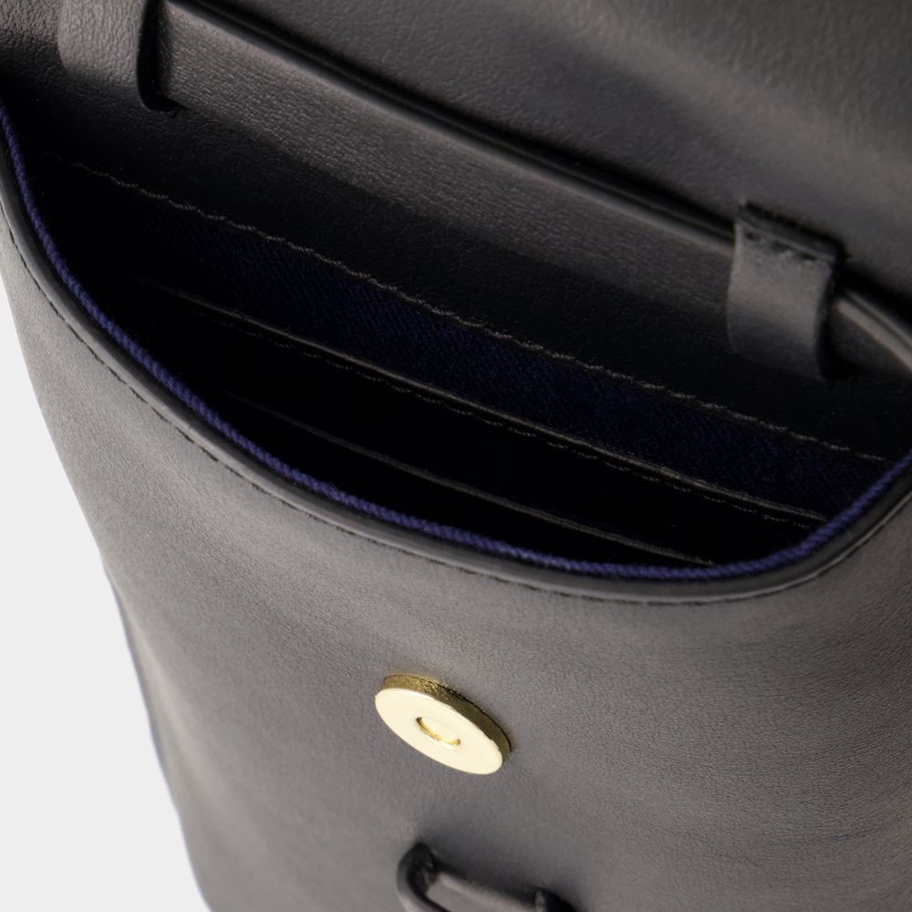 Ines De La Fressange Logo Shoulder Bag In Black