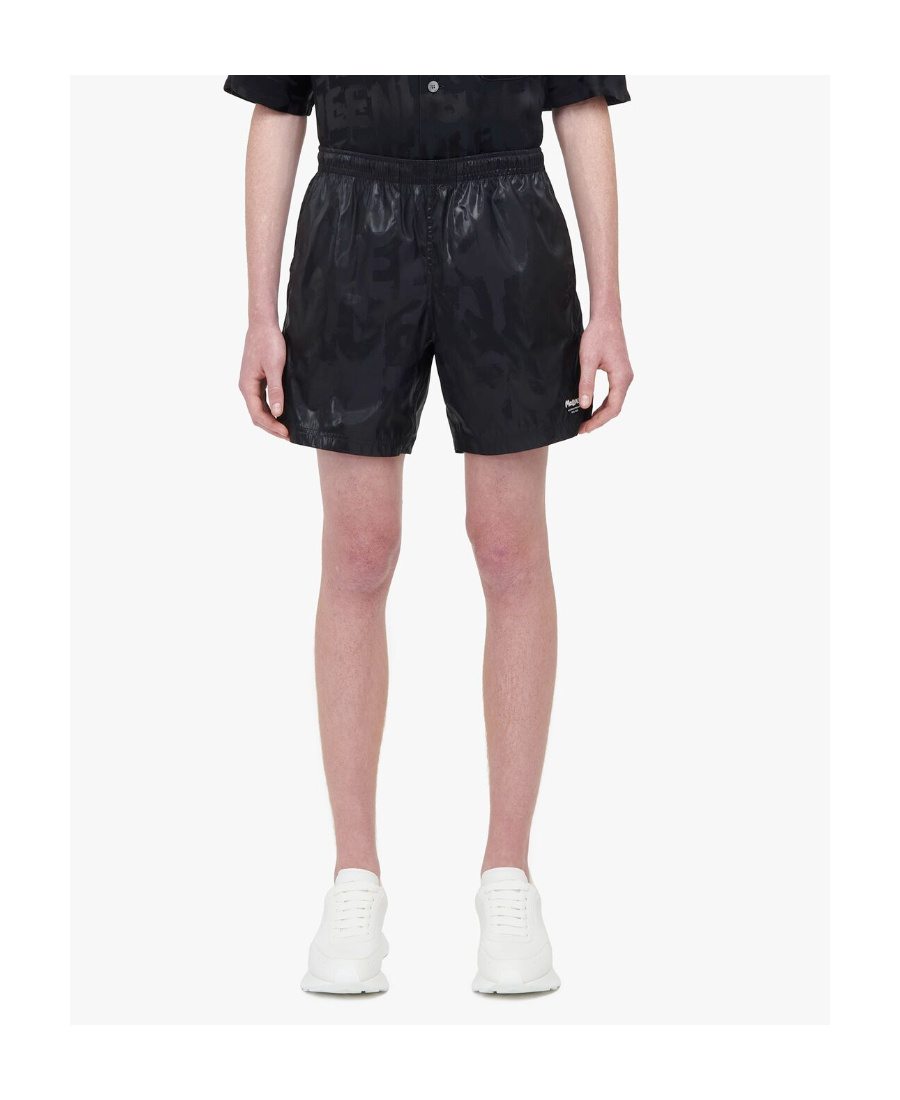 Alexander Mcqueen Solid Color Swim Shorts With Graffiti Print In Black