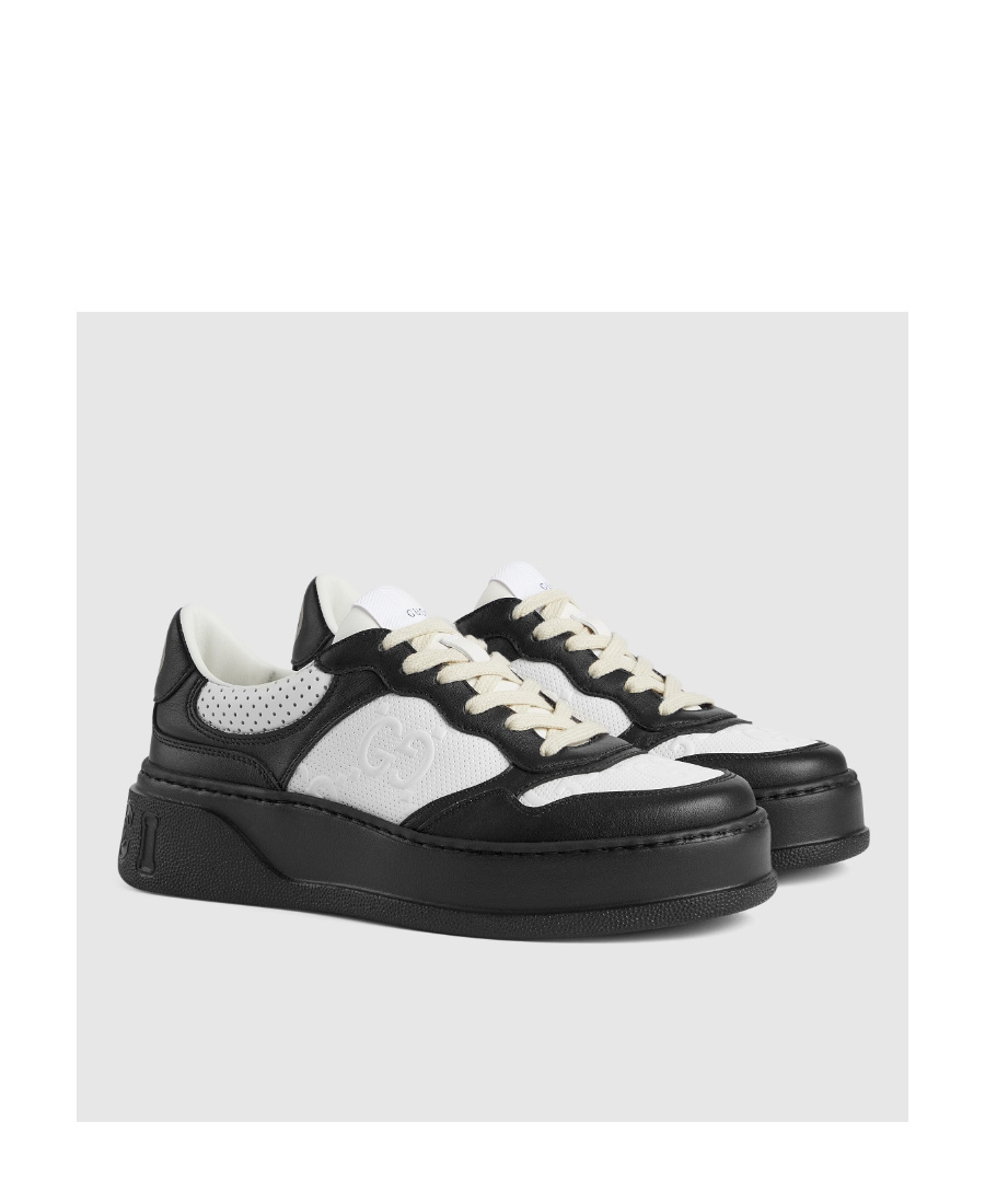 Gucci Gg Embossed Low-top Sneakers In Black
