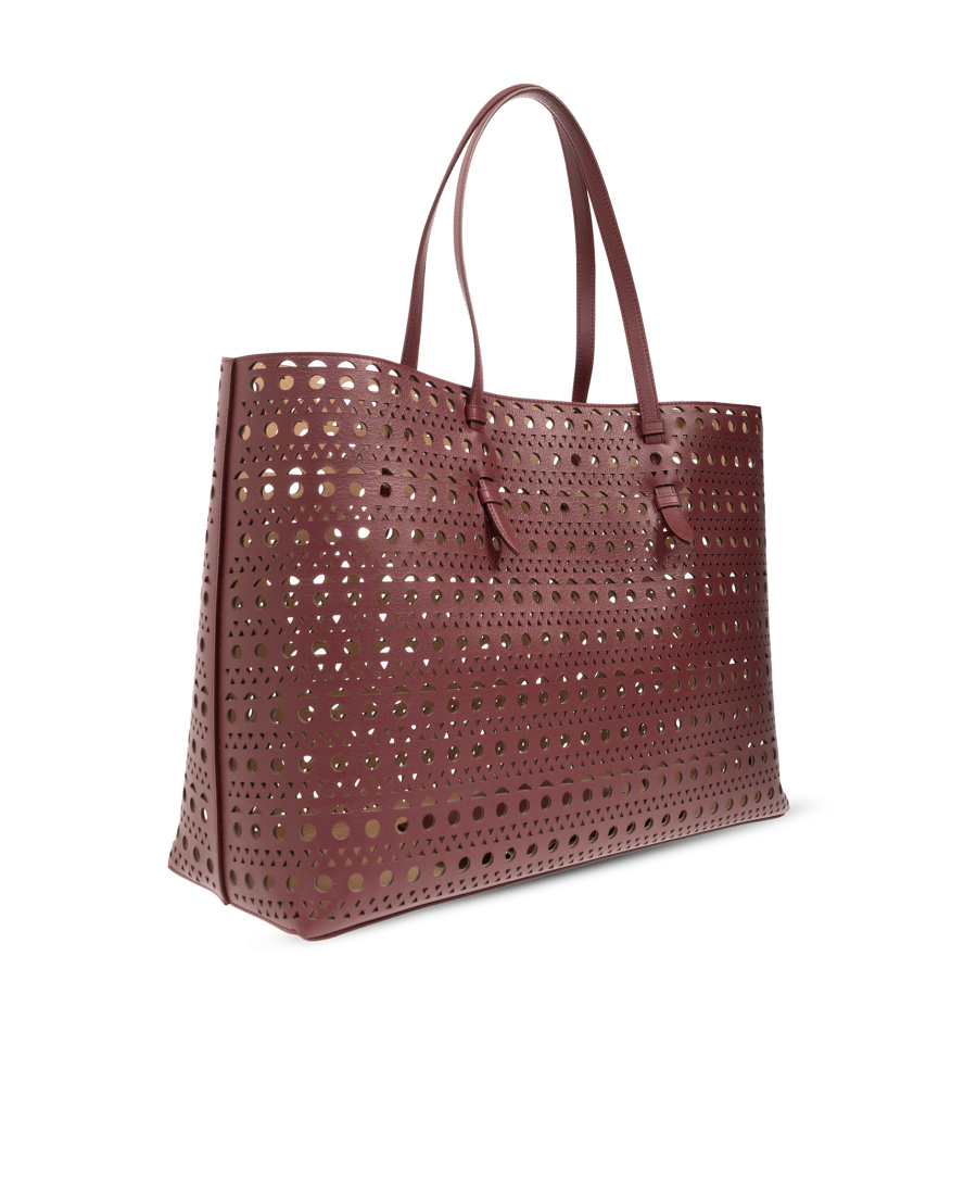Alaïa Hollowed-out Shoulder Bag In Red