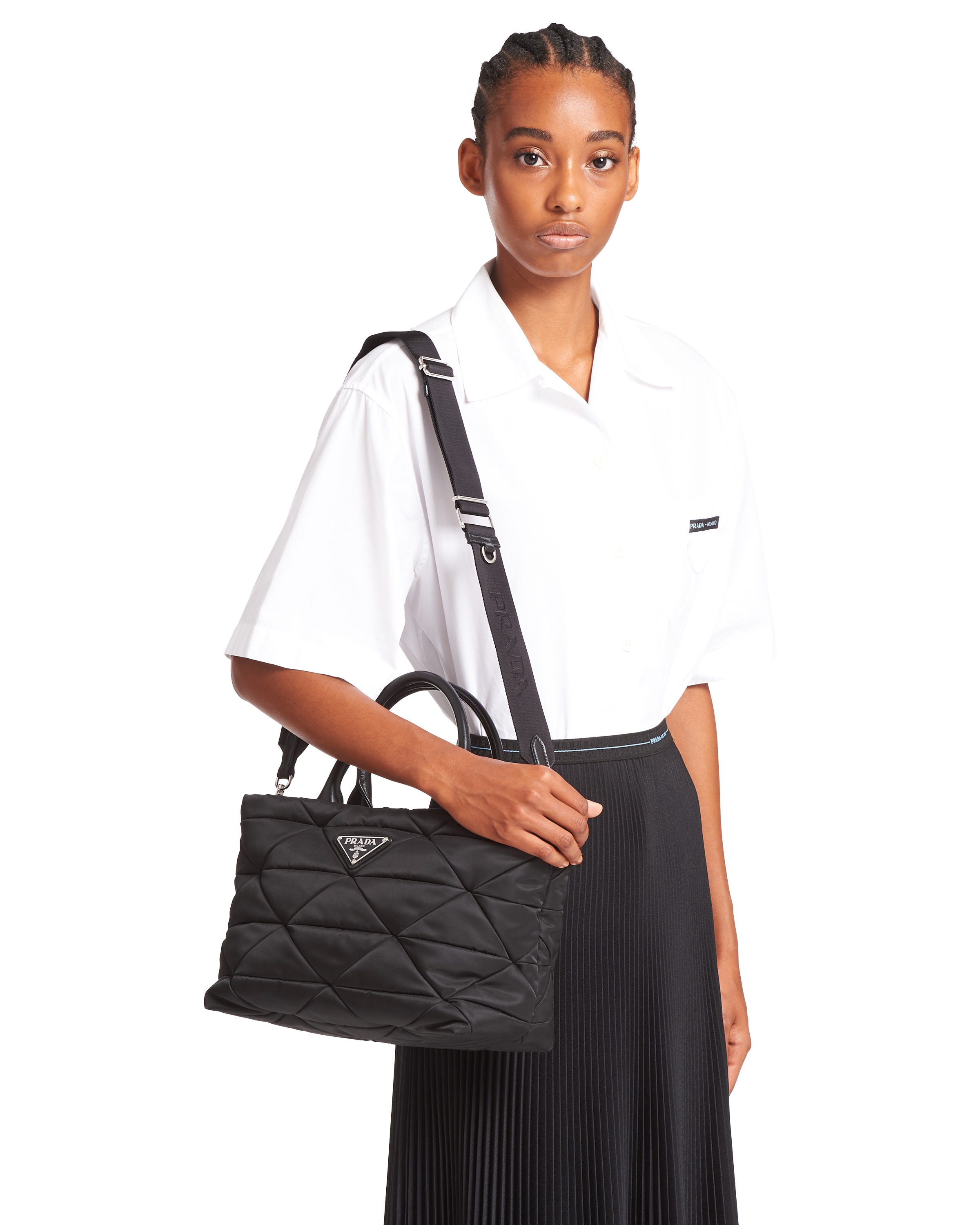 Prada Small Re-nylon Logo Plaque Top Handle Bag In Black