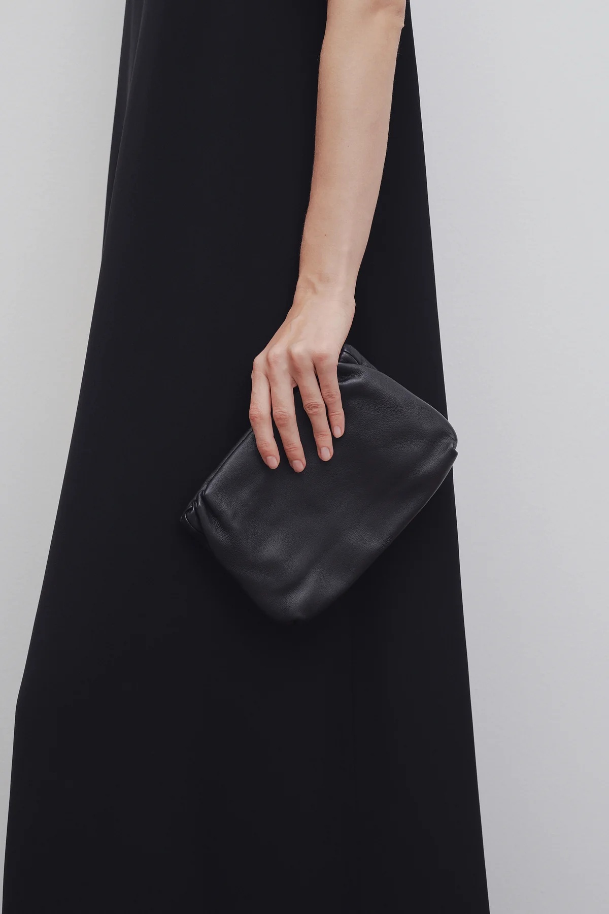 The Row Bourse Pleated Crossbody Bag In Black