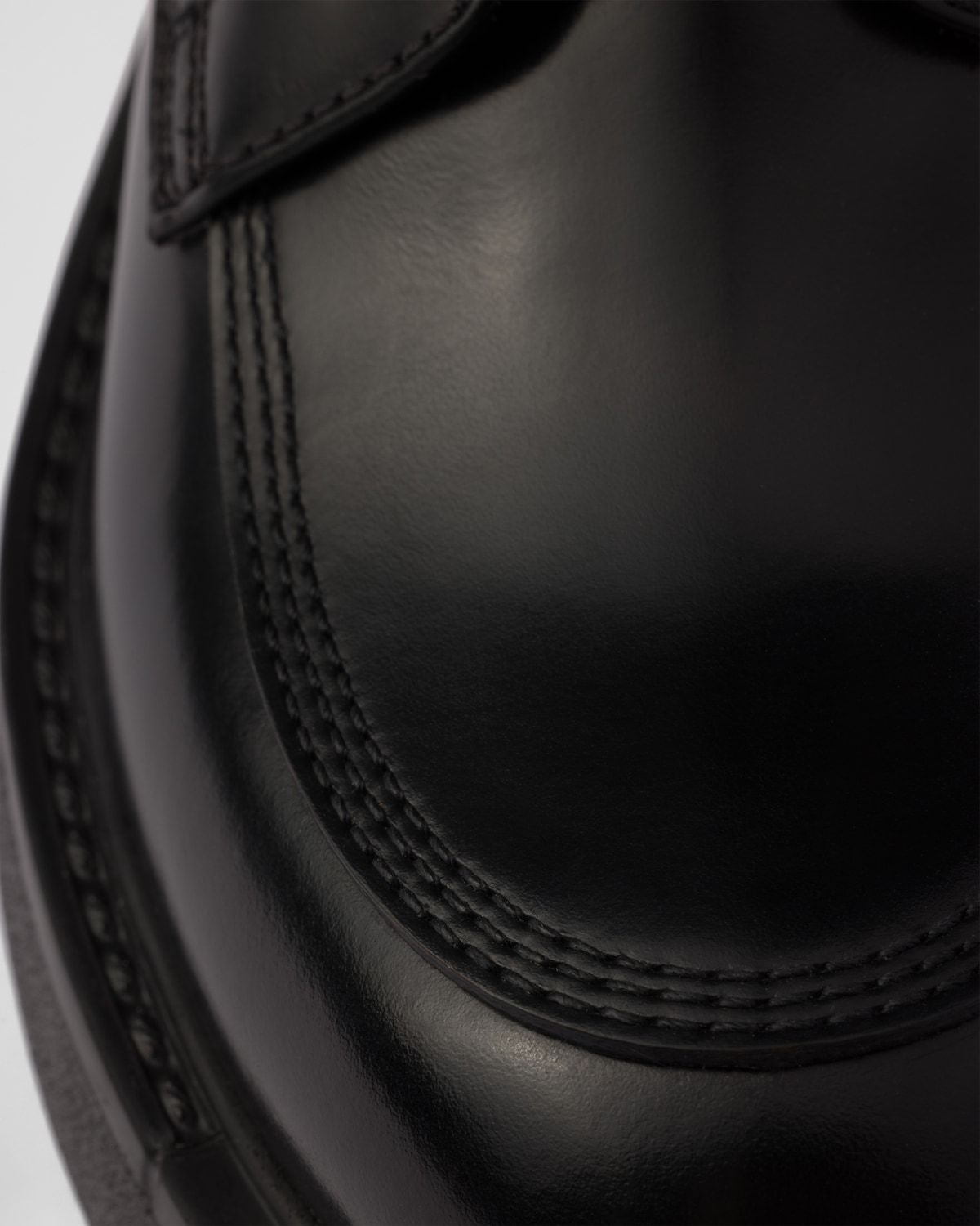 Prada Black Brushed Leather Ankle Boot In Black