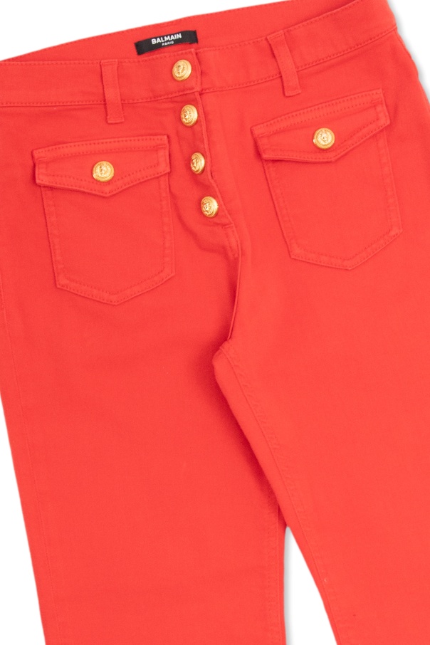 Balmain Lion Head-embellished Flared Jeans In Orange