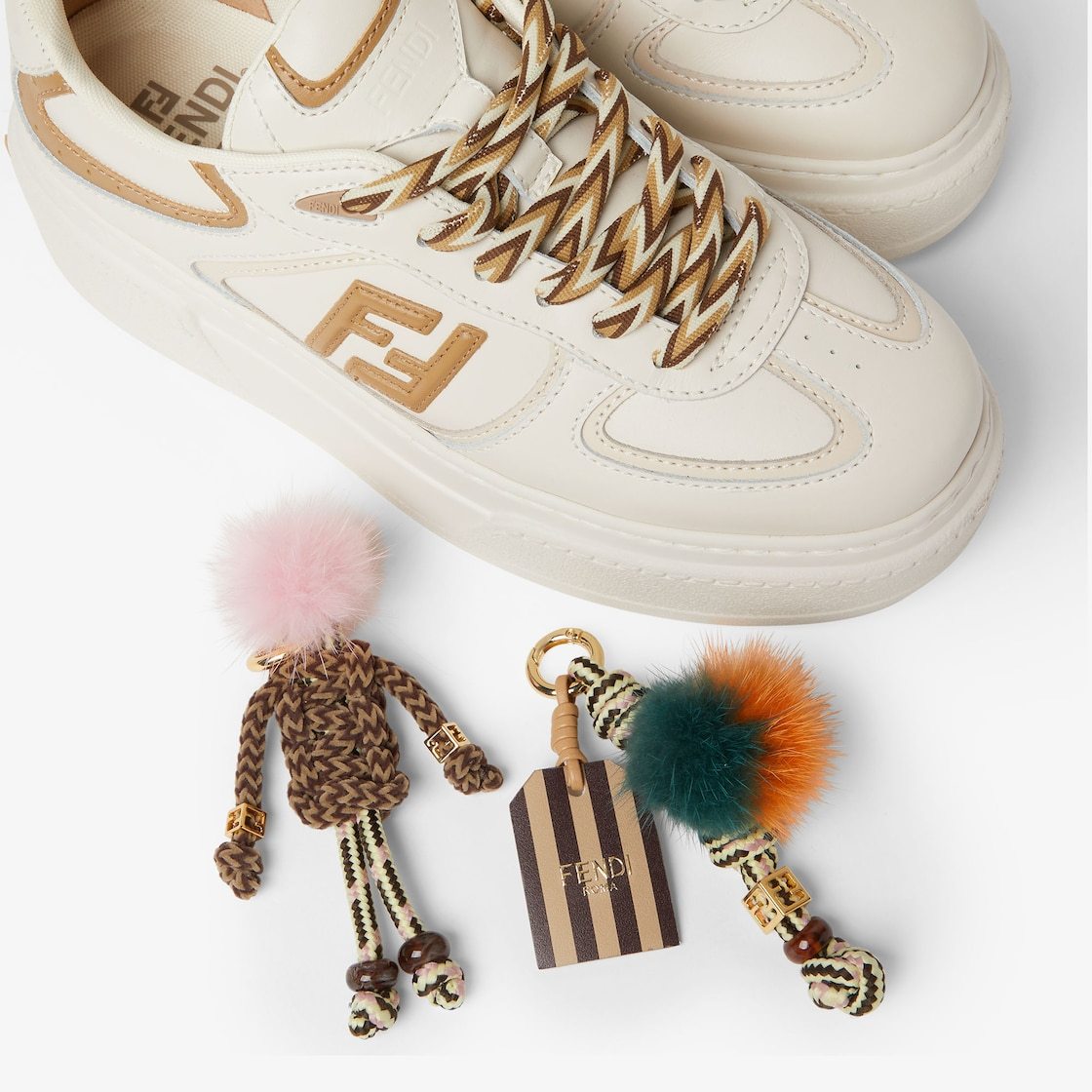 Fendi Low Top Platform Shoes In White Leather With Charm In Neutral