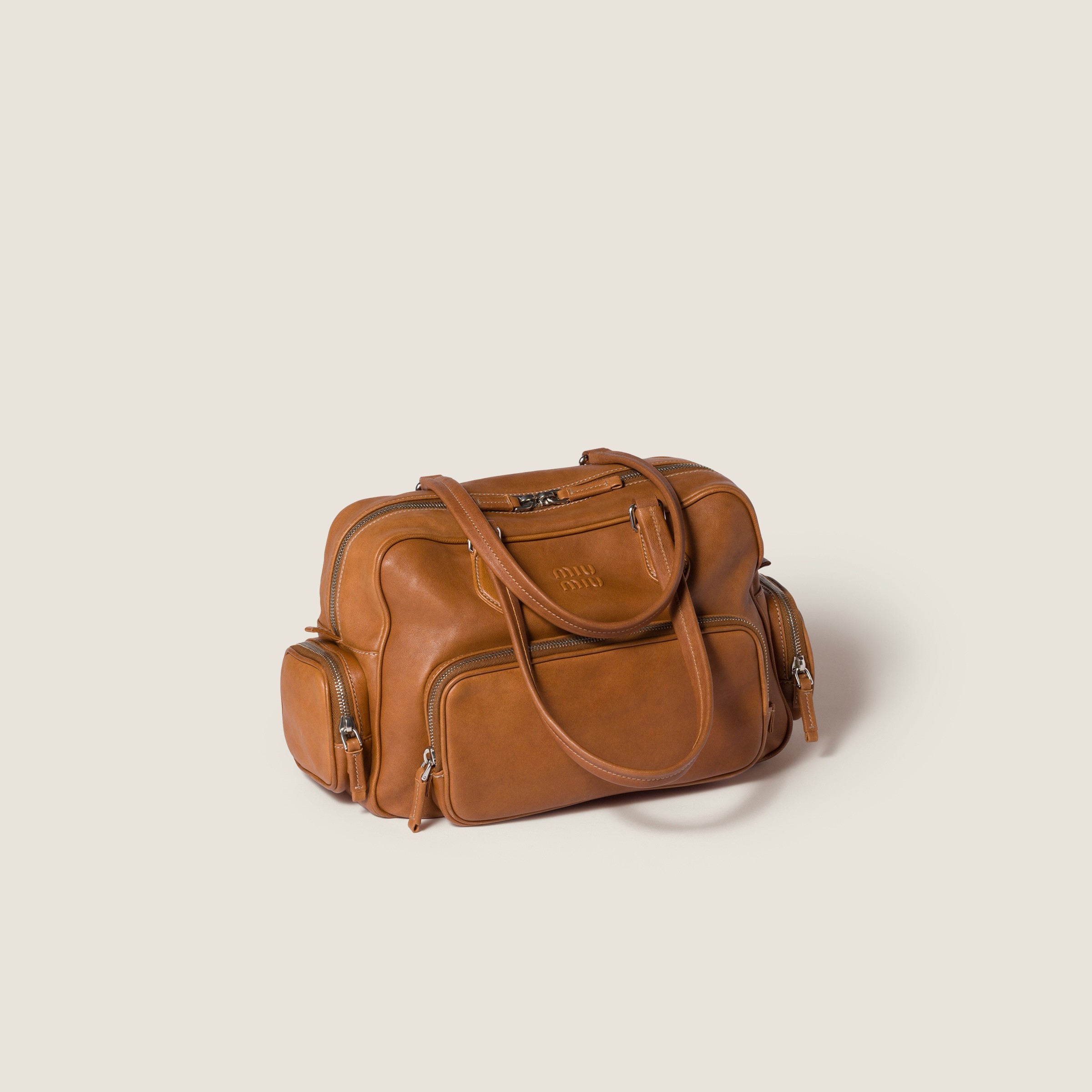 Miu Miu Pocket Nappa Leather Top-handle Bag In Brown