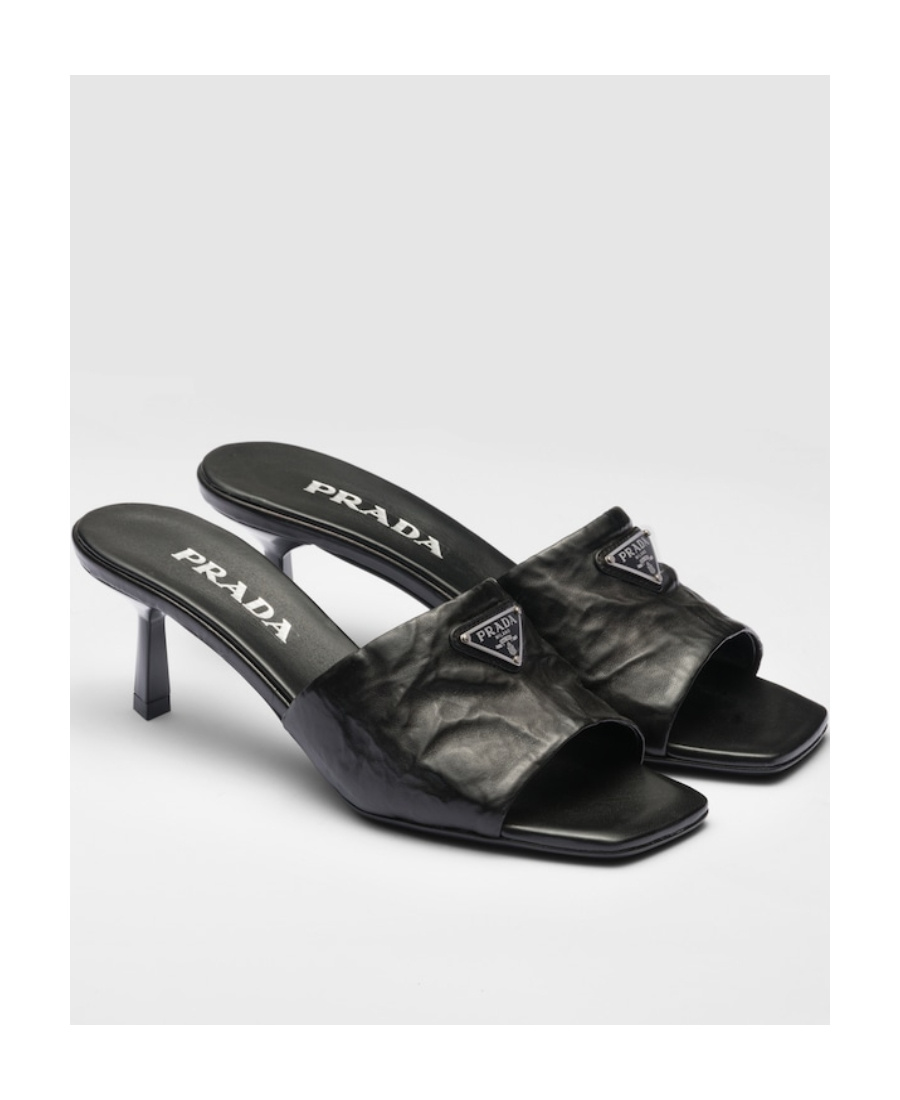 Prada Triangle Logo Quilted Mules In Black