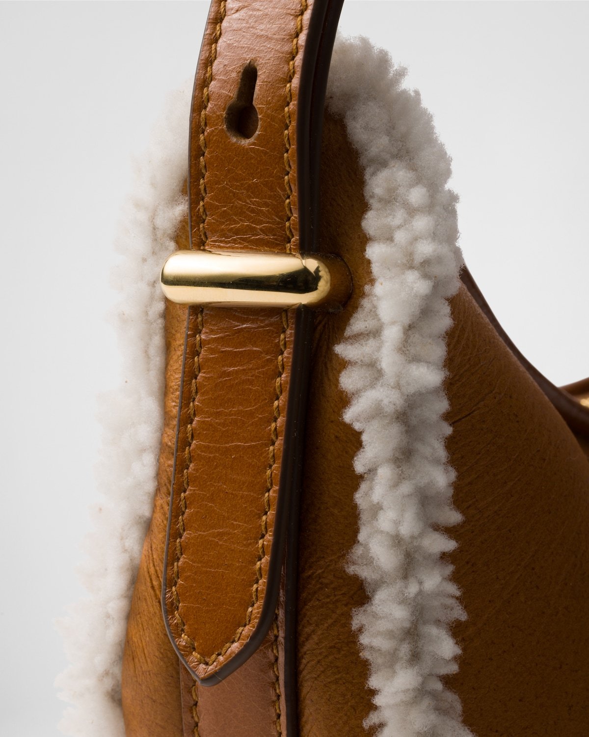 Prada Small Shearling Shoulder Bag In Brown