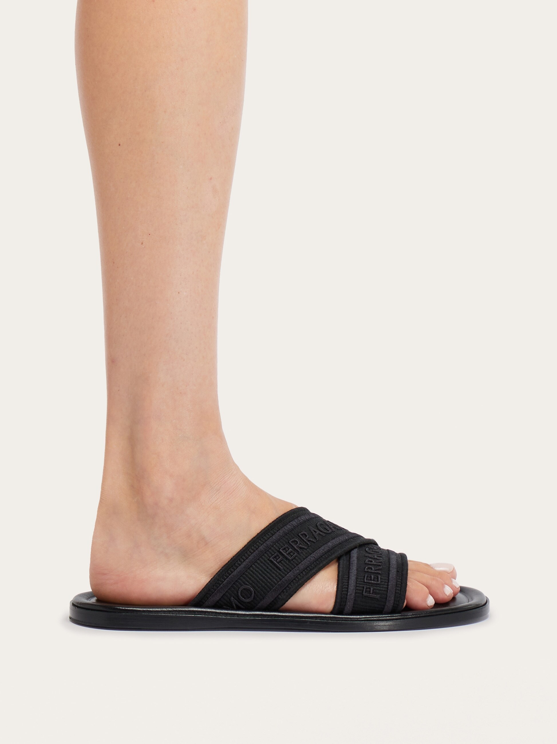 Ferragamo Logo-print Slip-on Style Slides In Black