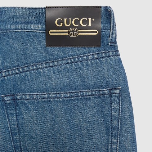 Gucci Wide-leg Denim Jeans With Leather Logo Tag And Roll-up Ankle Cuffs For Women In Blue