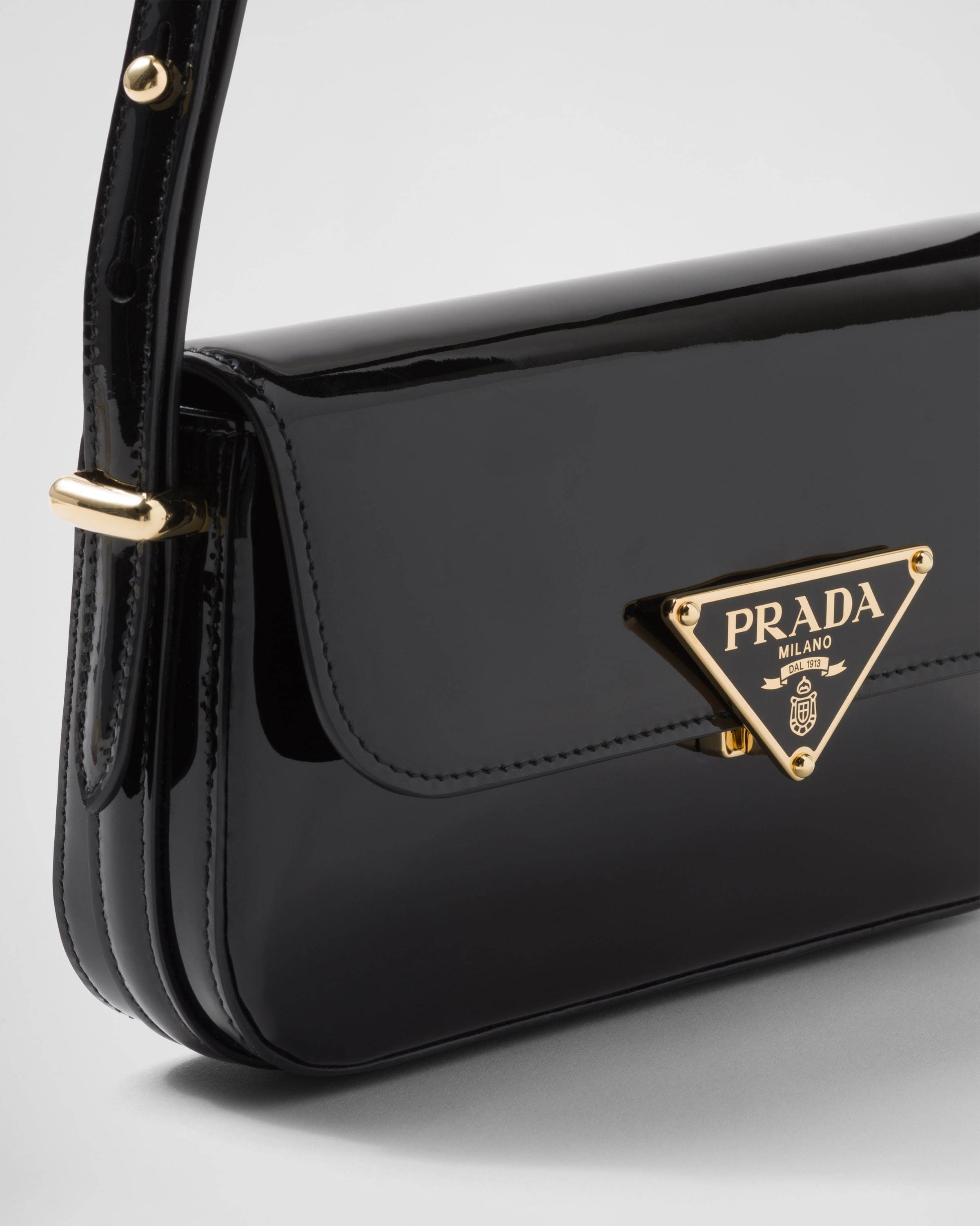 Prada Logo Patent Leather Shoulder Bag In Black