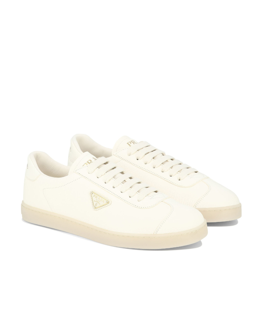 Prada Mens White Triangle-plaque Vintage-effect Leather Low-top Trainers In Nude