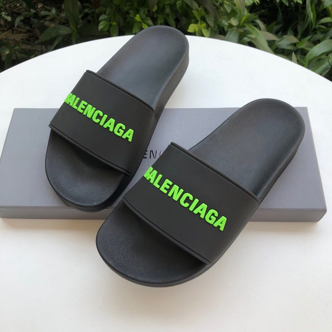 Balenciaga Embossed Logo Pool Slides In Black