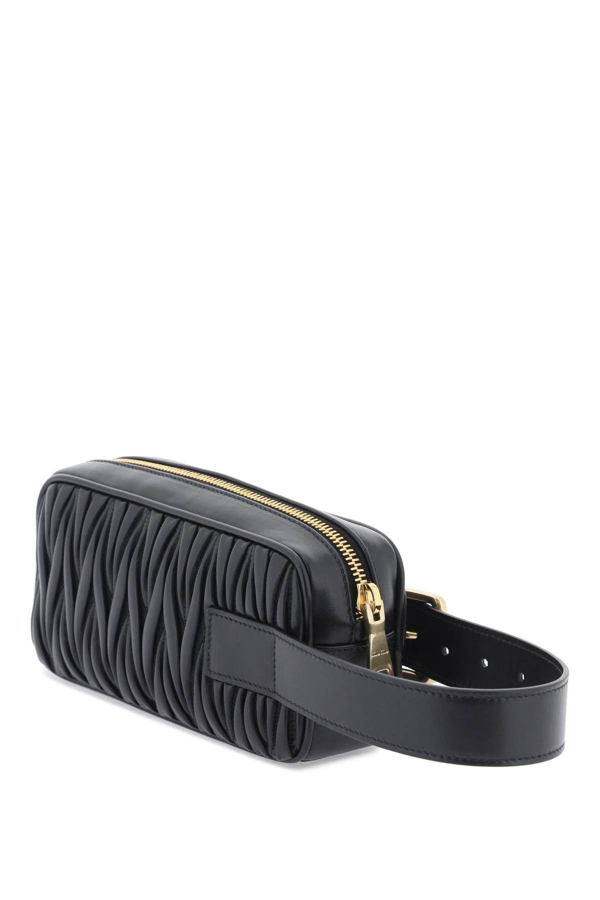 Miu Miu Woman Black Leather Clutch In Black