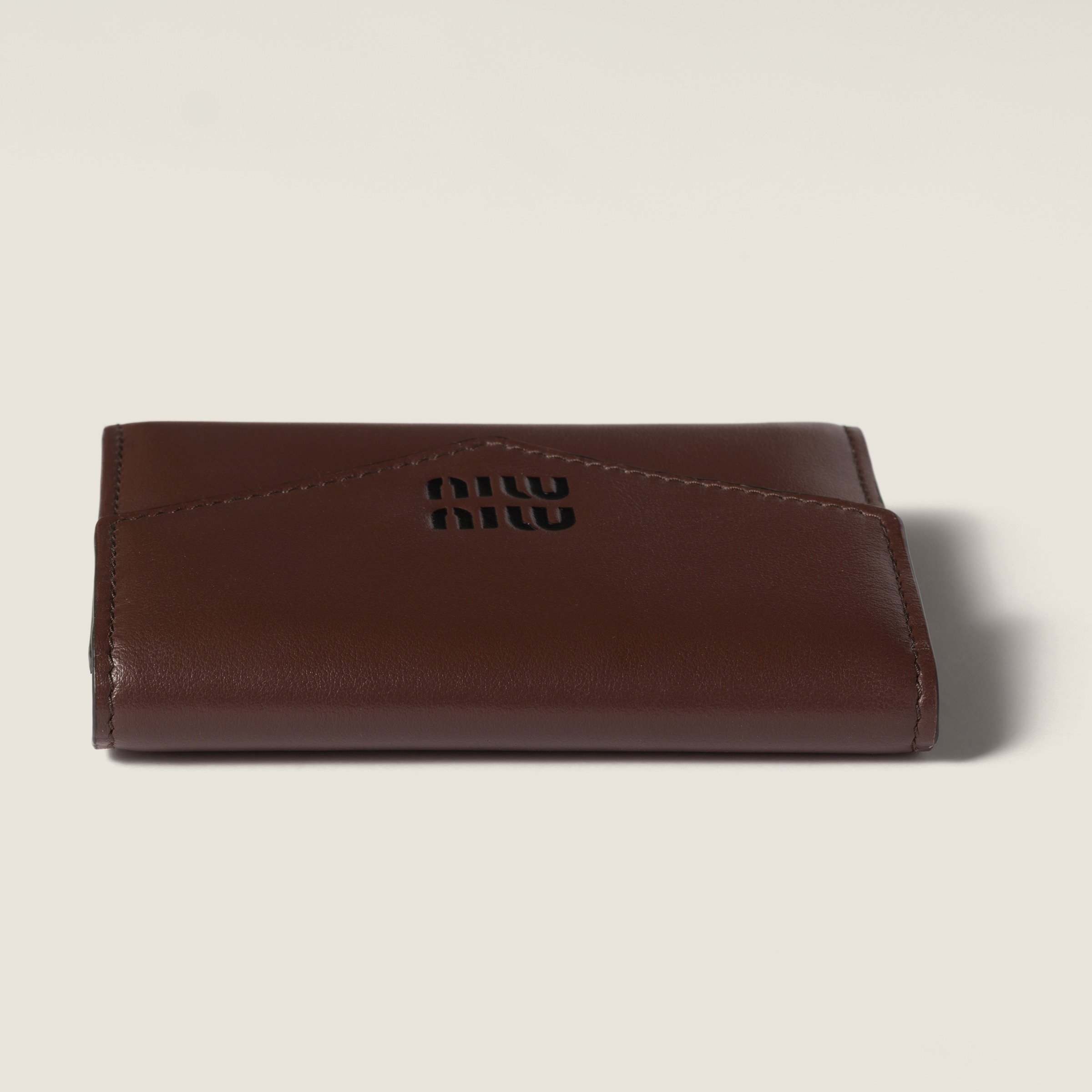 Miu Miu Compact Leather Wallet Fold-over Flap In Brown