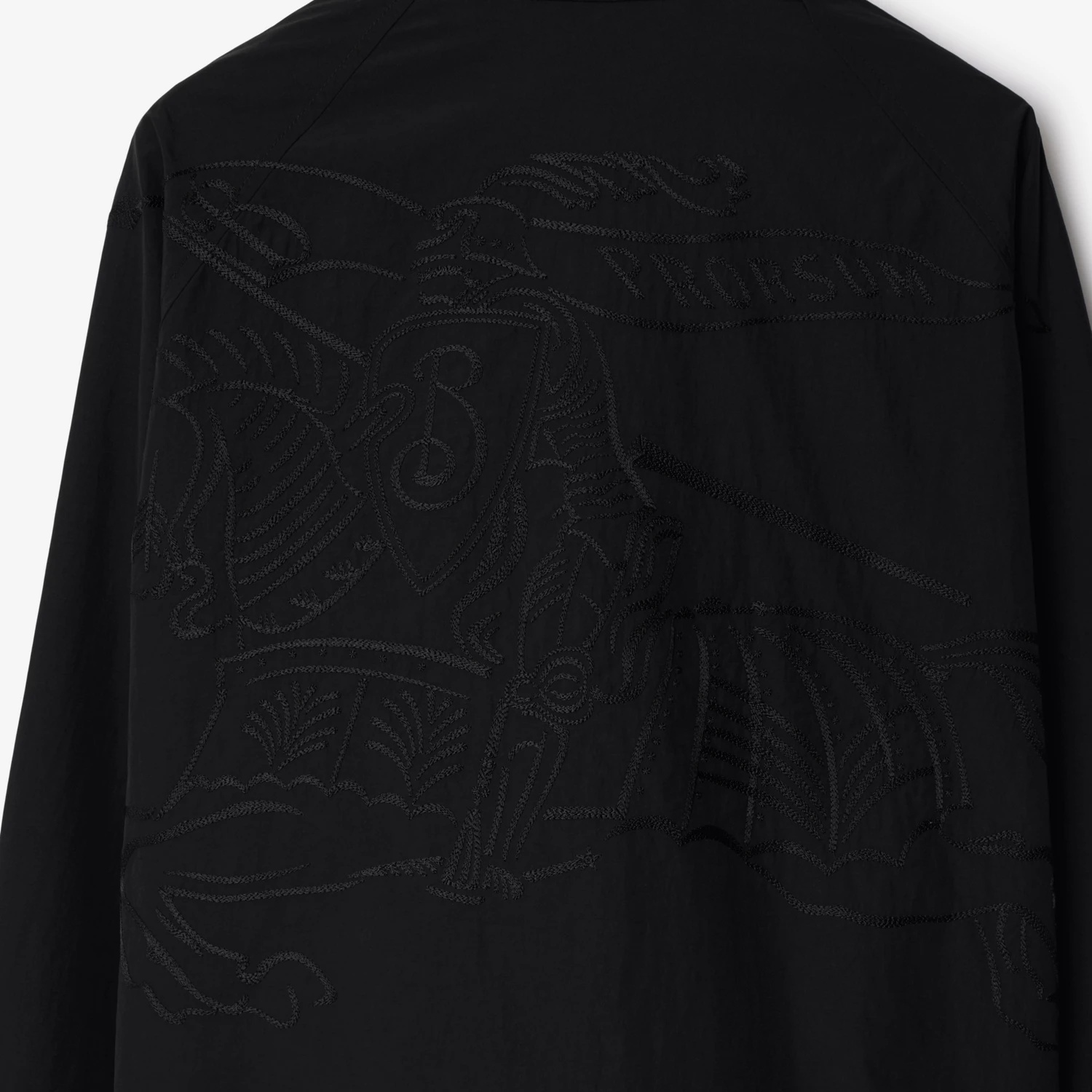 Burberry Logo Embossed Drawstring Jacket In Black