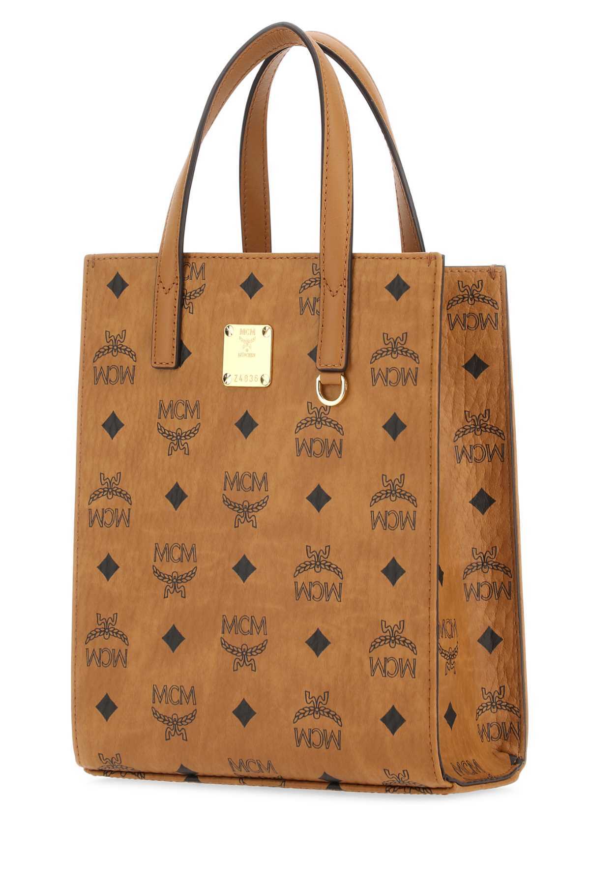 Mcm Logo Print Mini Tote Bag In Brown