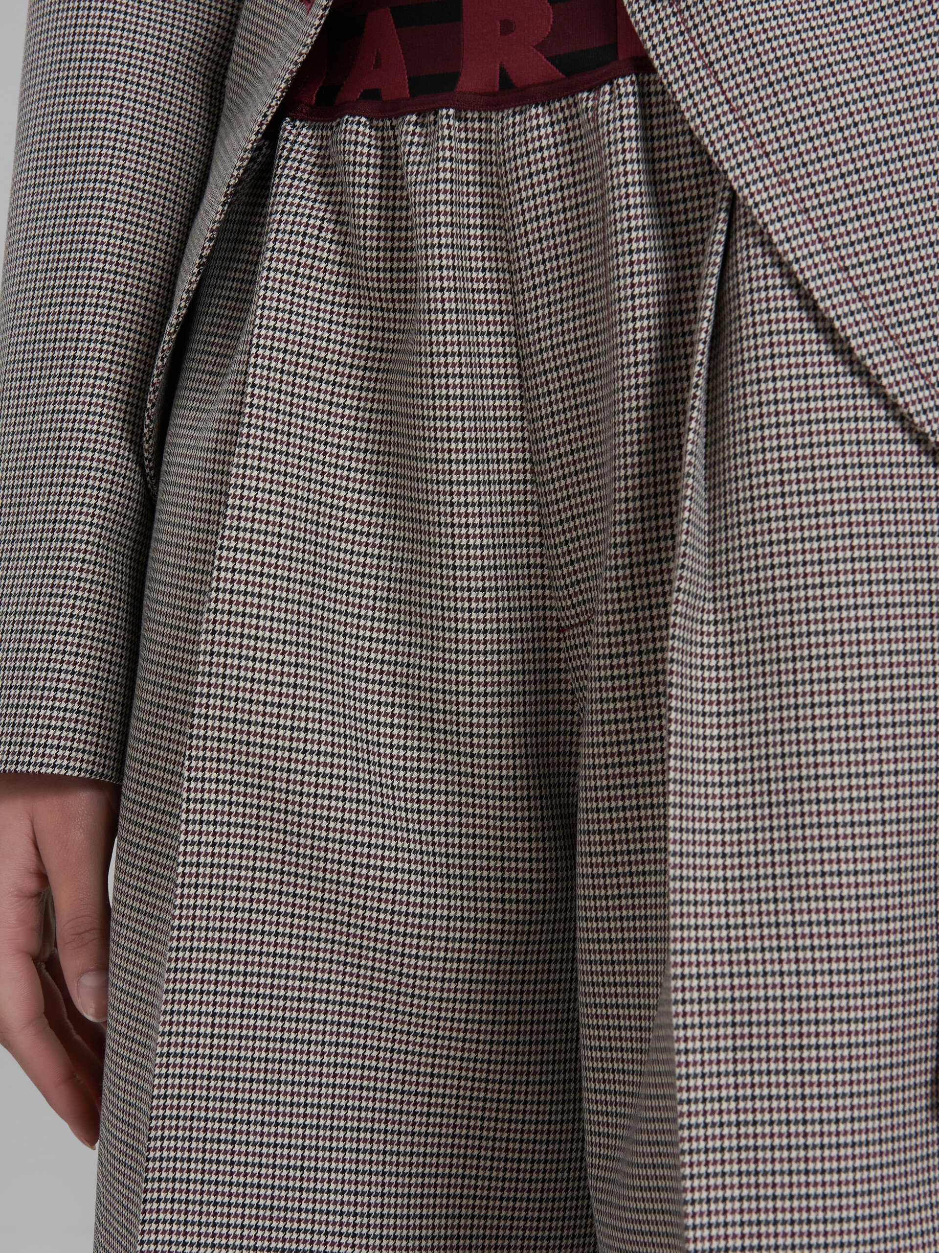 Shop Marni Logo-waistband Houndstooth Flared Trousers In Gray