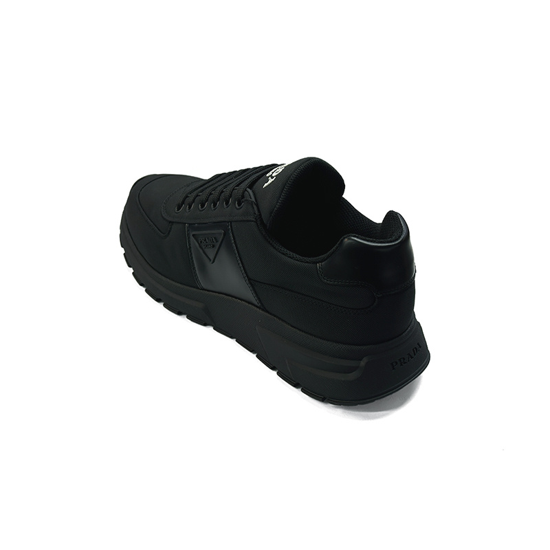 Prada Round-toe Sneakers In Black