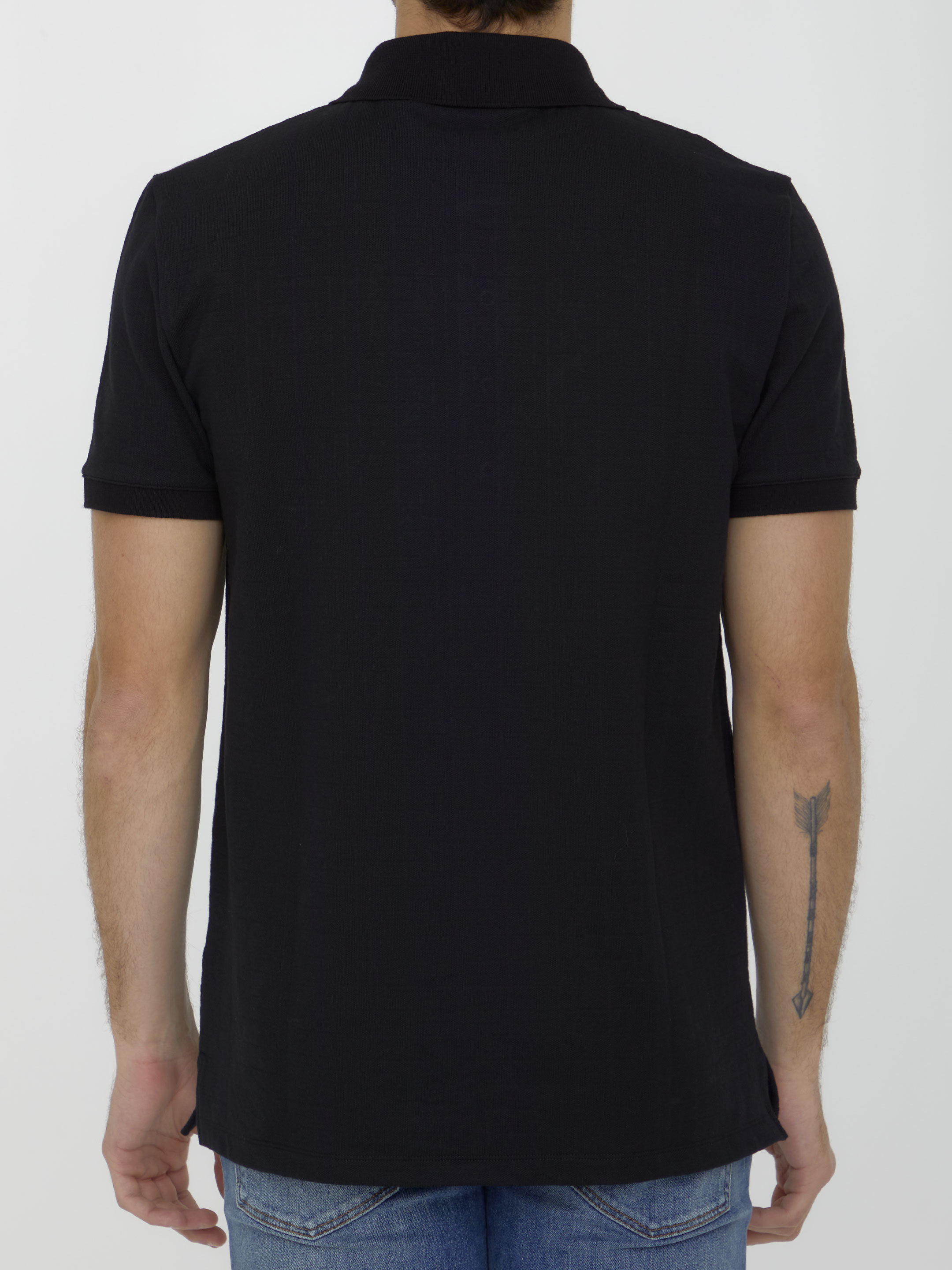 Shop Balmain Embossed-buttons Polo Shirt In Black