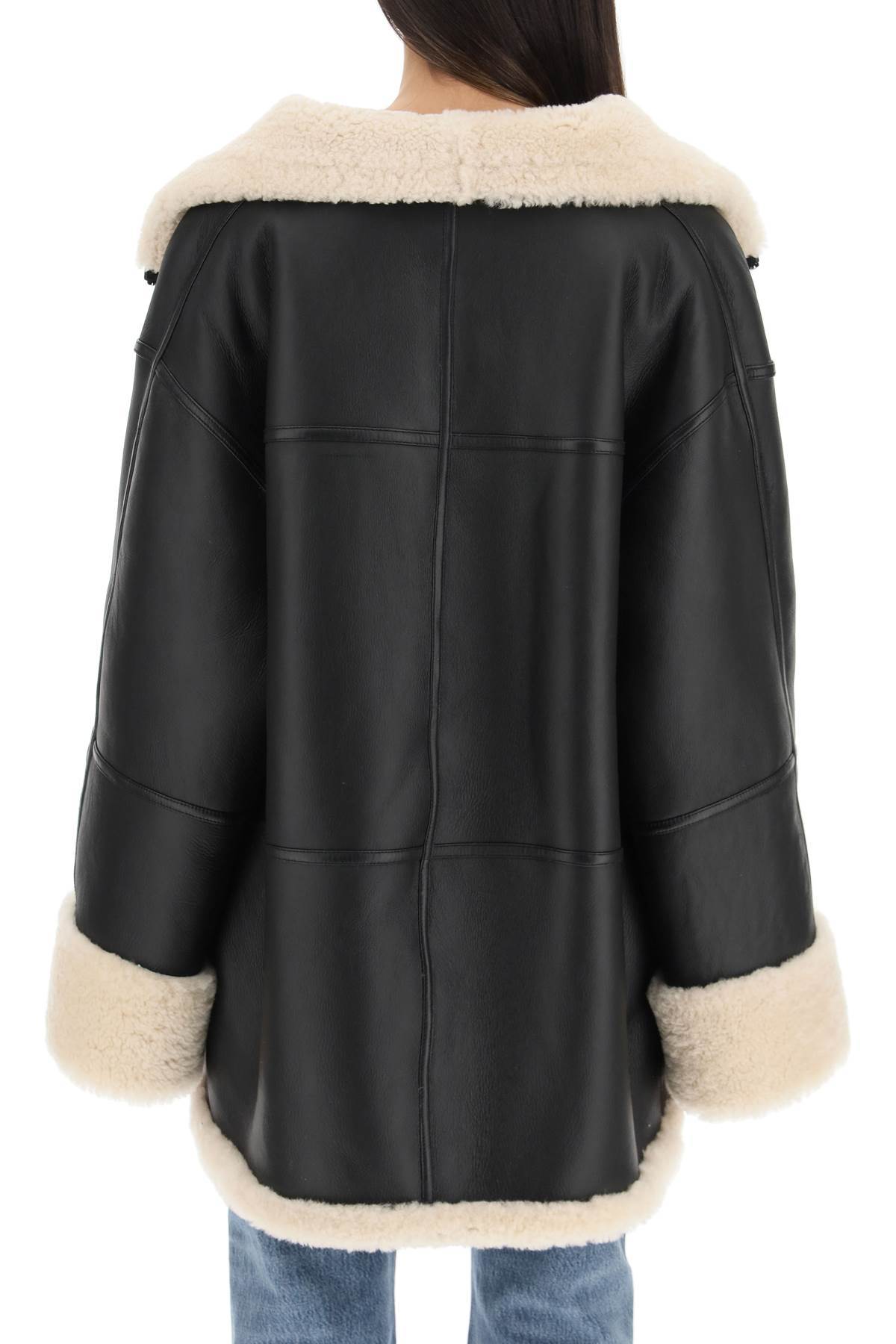 Shop Totême Shearling-lined Leather Jacket In Black