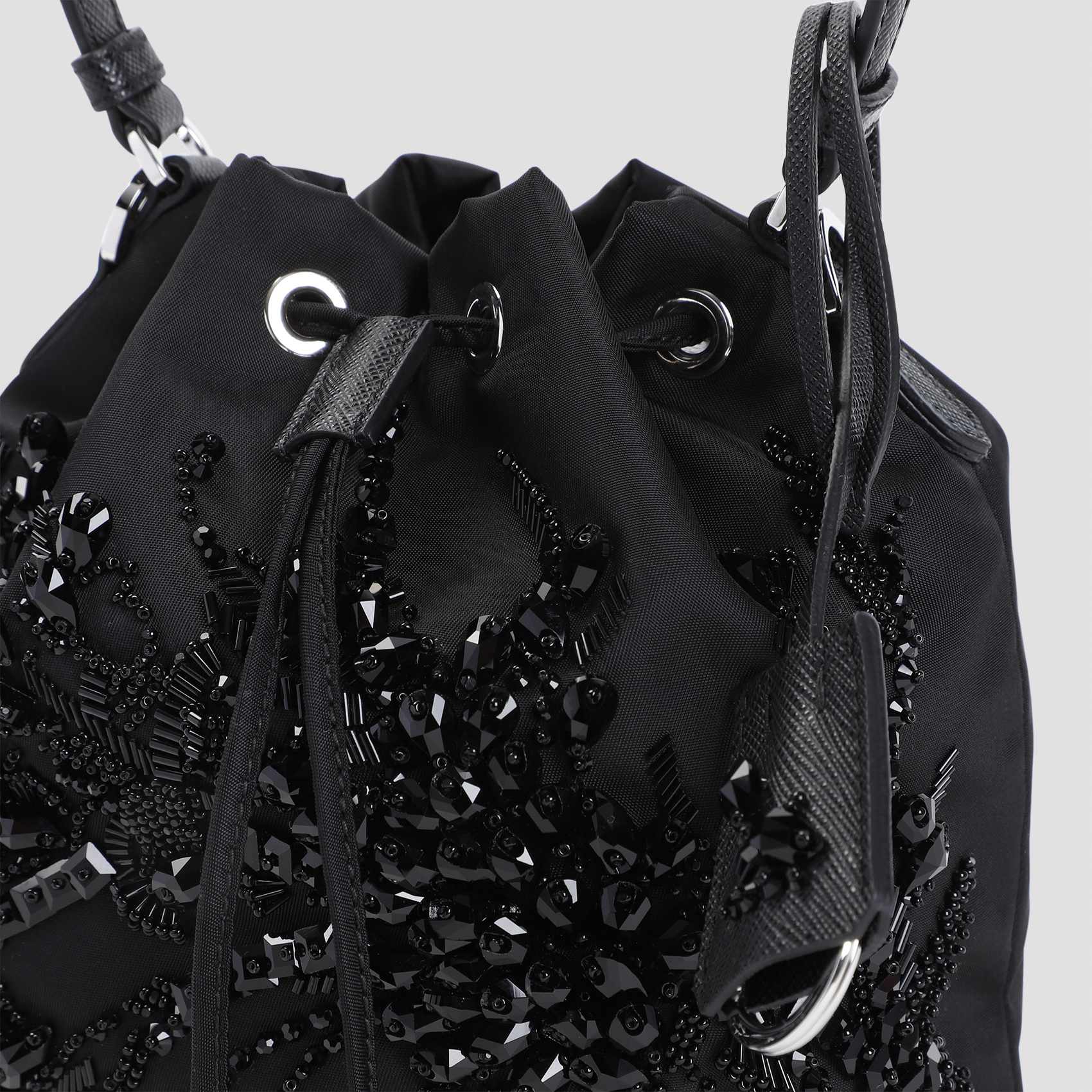 Prada Re-nylon Logo Plaque Bucket Bag In Black