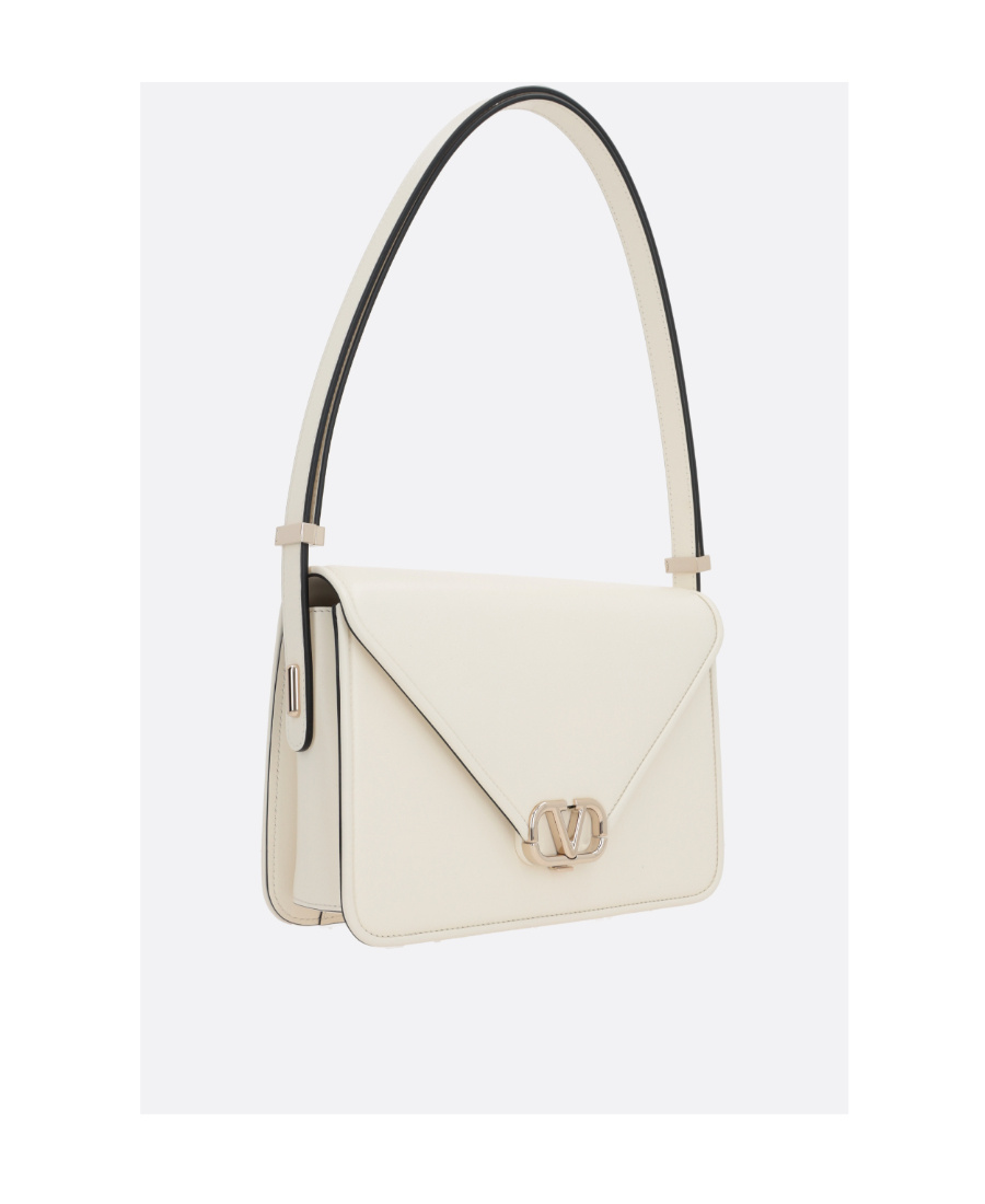 Valentino Logo Plaque Foldover Top Shoulder Bag In White