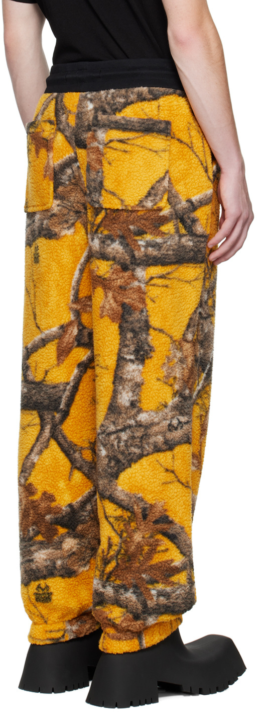 Moose Knuckles Graphic-print Fleece Track Pants In Yellow