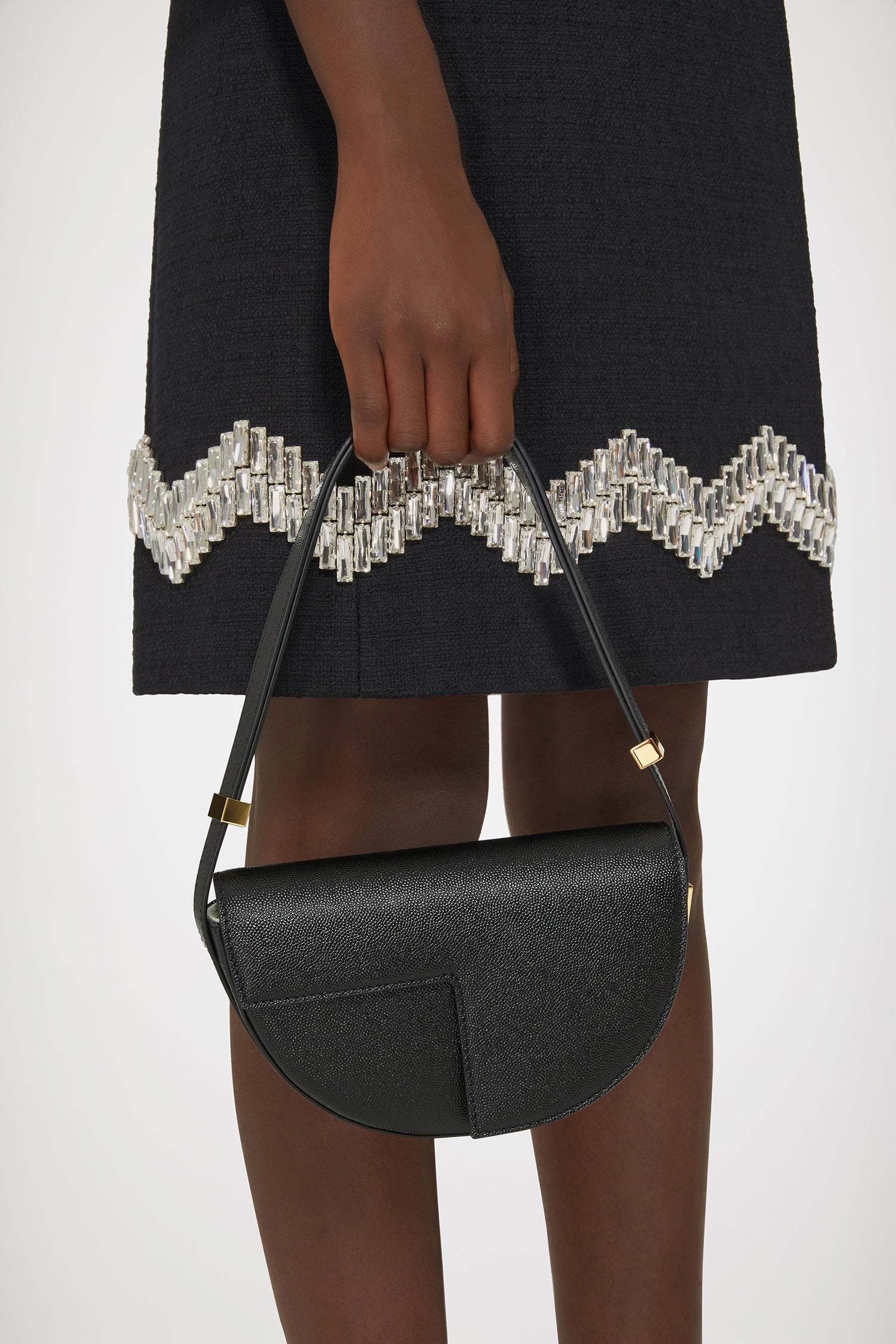 Patou Semi-round Shoulder Bag In Black