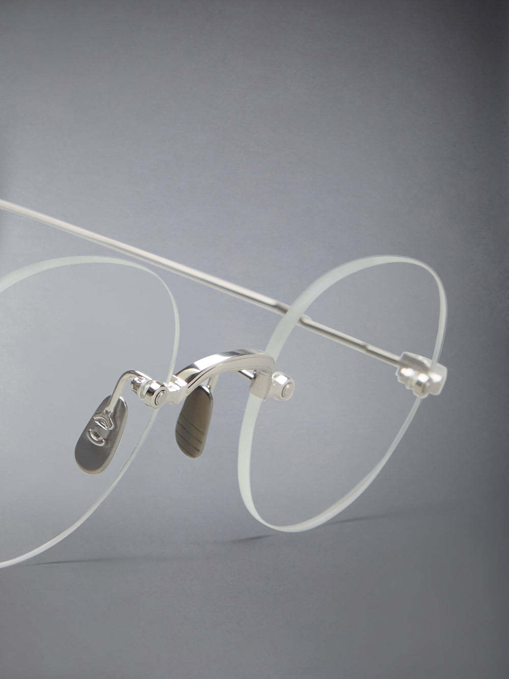 Thom Browne Eyewear Round Frame Glasses In White