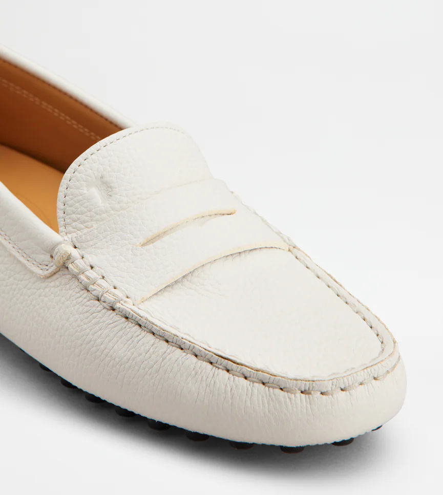 Tod's Gommino Embossed Slip-on Loafers In White