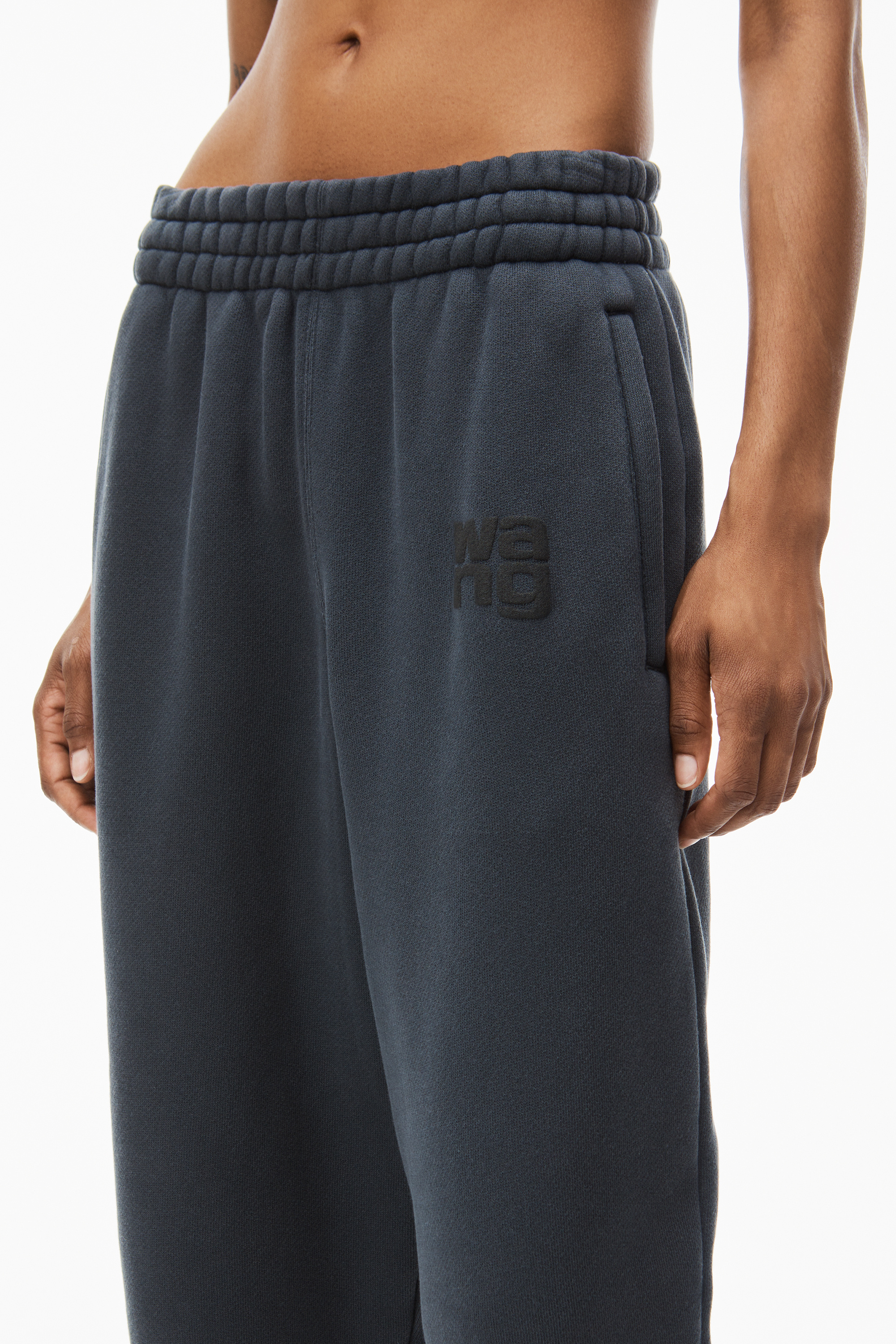 ALEXANDER WANG RUBBERISED-LOGO COTTON-BLEND TRACK PANTS 