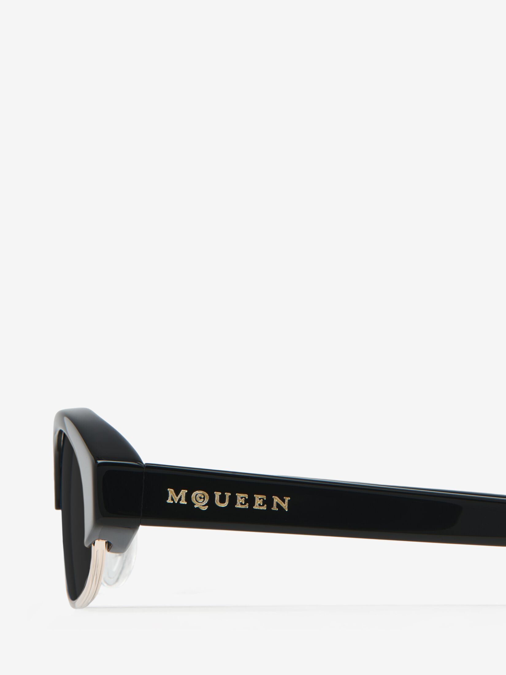 Alexander Mcqueen Oval Sunglasses In Black