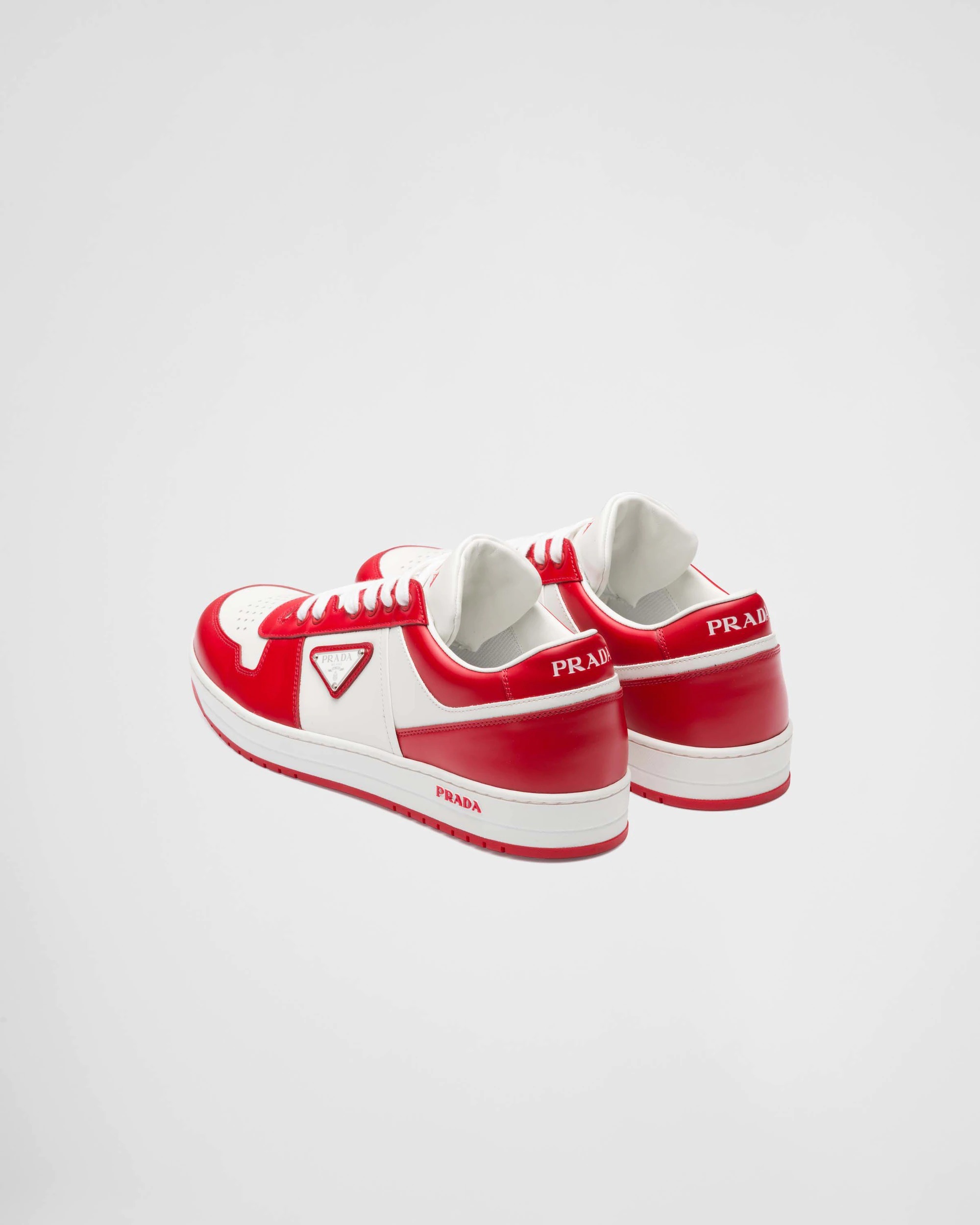 Shop Prada Downtown Leather Sneakers In White