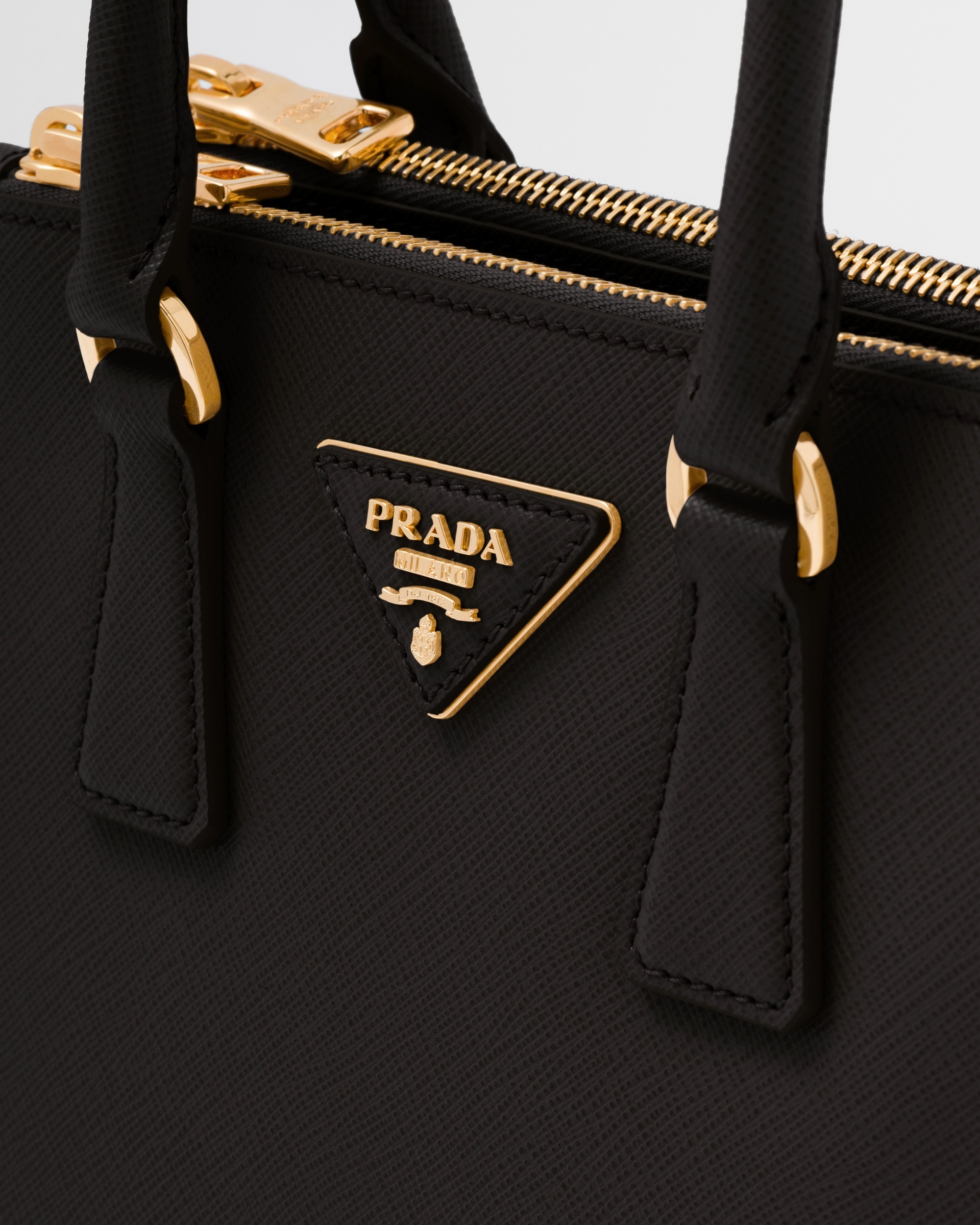 Prada Galleria Saffiano Leather Mini Logo Handbag In Black
