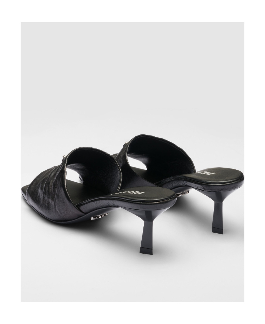 Prada Triangle Logo Quilted Mules In Black